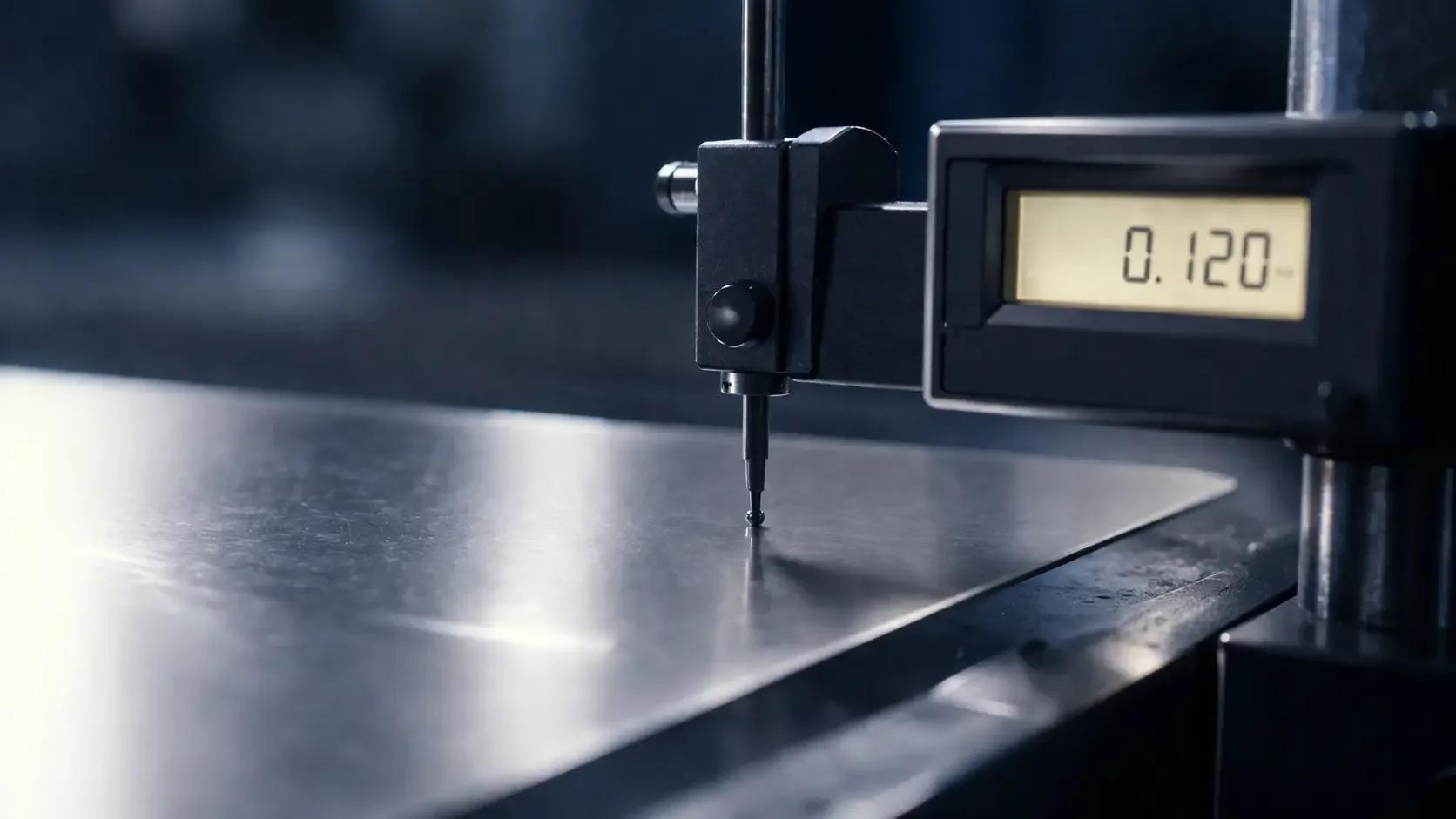 Precision thickness measurement of tinplate steel — GR Trading verifies mill specifications with digital gauge inspection, ensuring every shipment meets customer-specified gauge tolerances before delivery to US manufacturers.