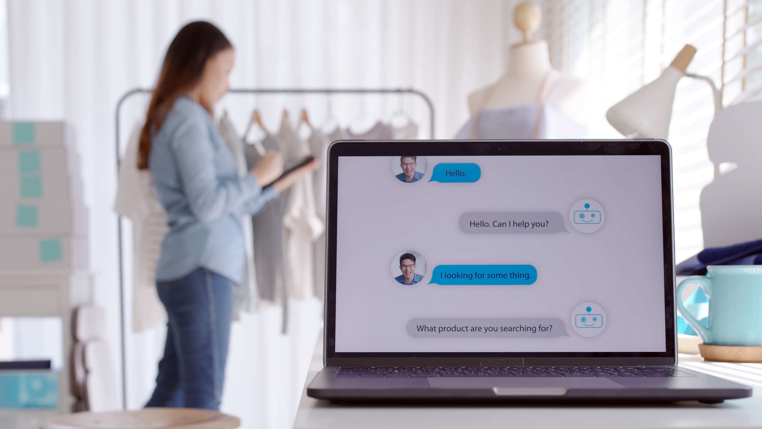 a chat bot on a laptop screen with a woman tailoring dresses