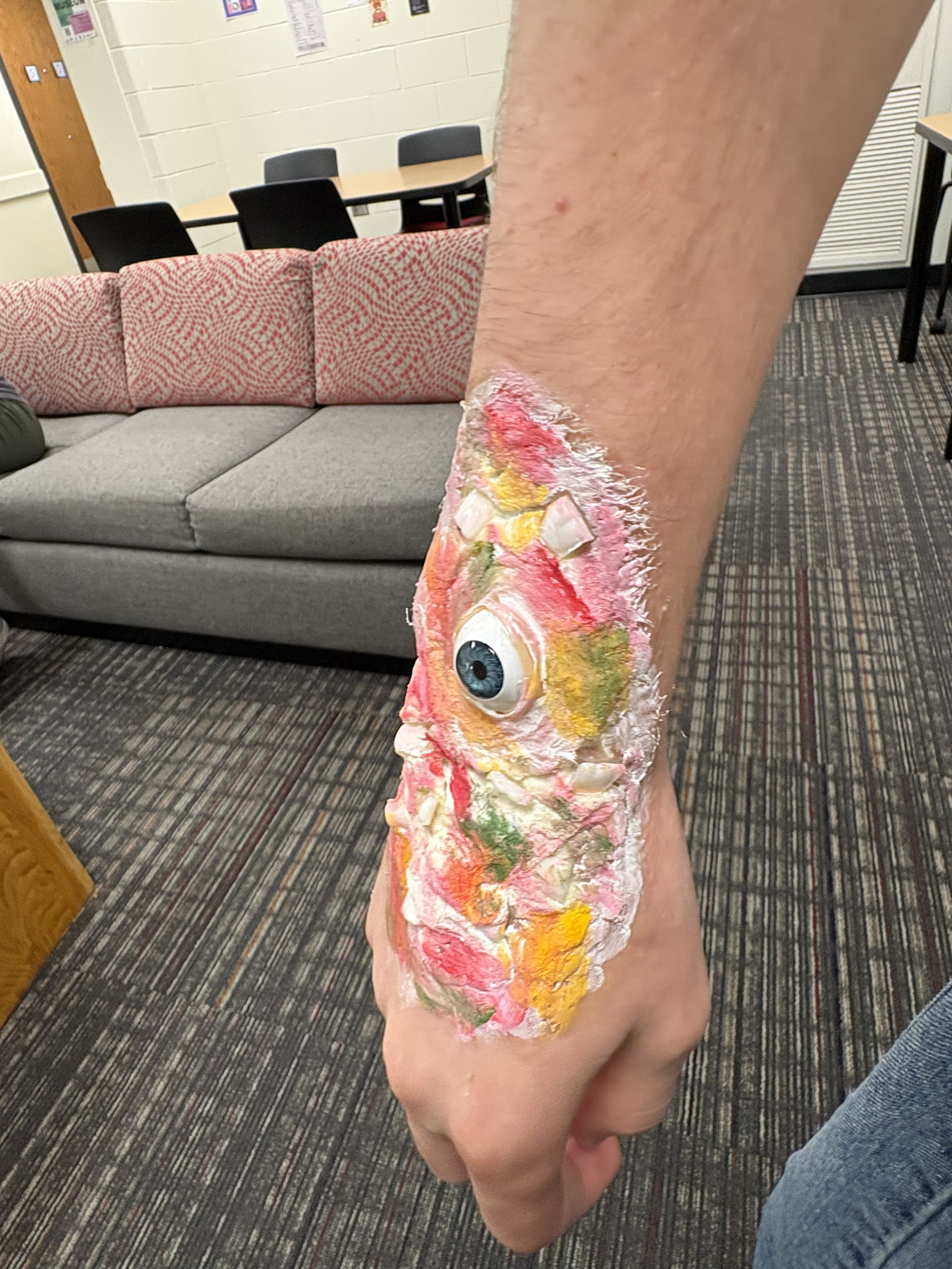 Makeup added with various bright, odd colors