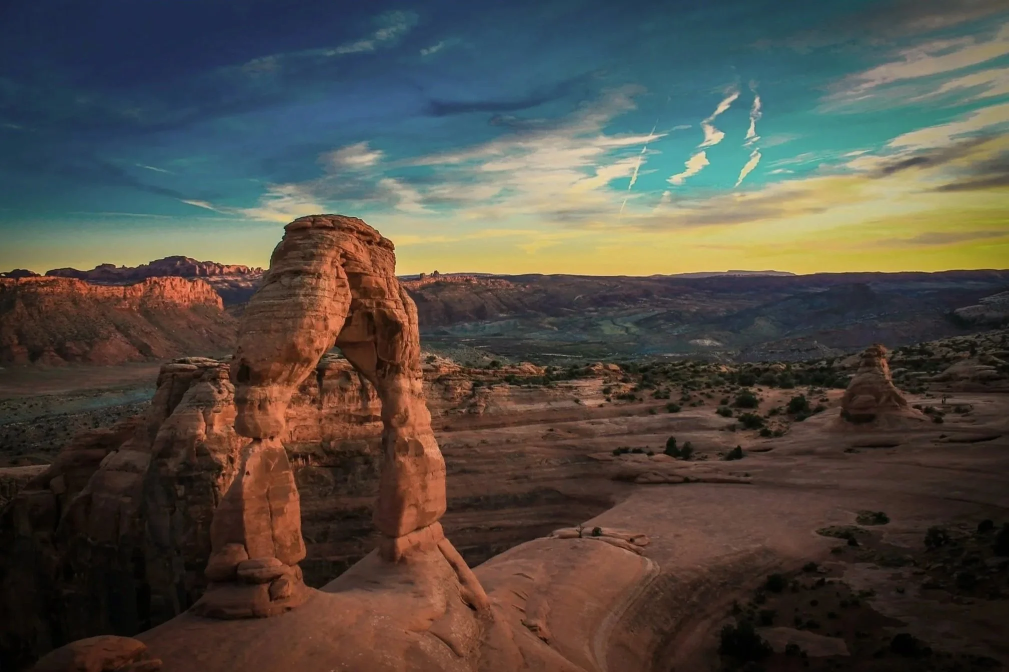 Southern Utah red rock arch at sunset, reflecting the natural landscape and sense of place that inspires Strata’s philosophy.