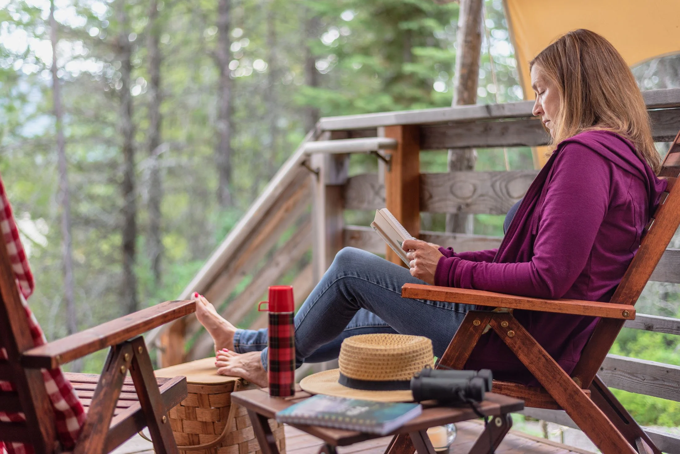 cabin-deck-woman_Mara_lake-2200px.jpg