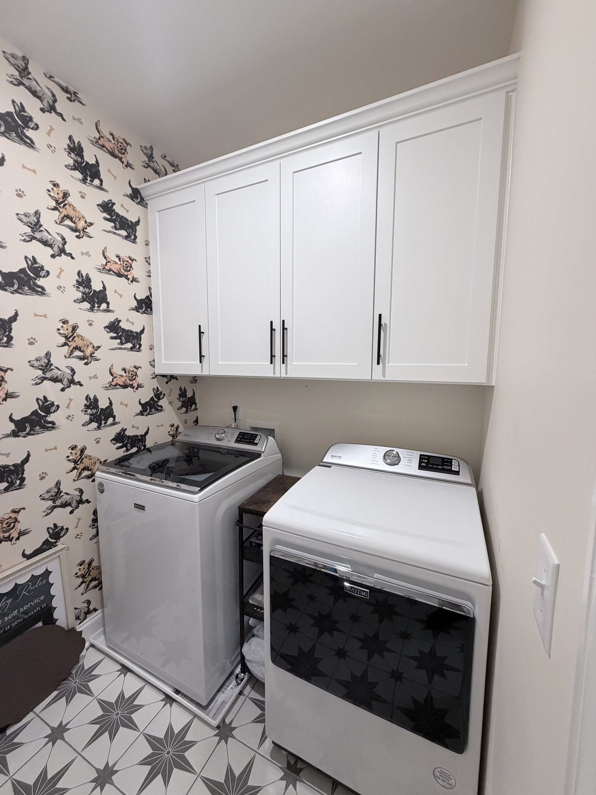 Laundry room with white custom cabinets