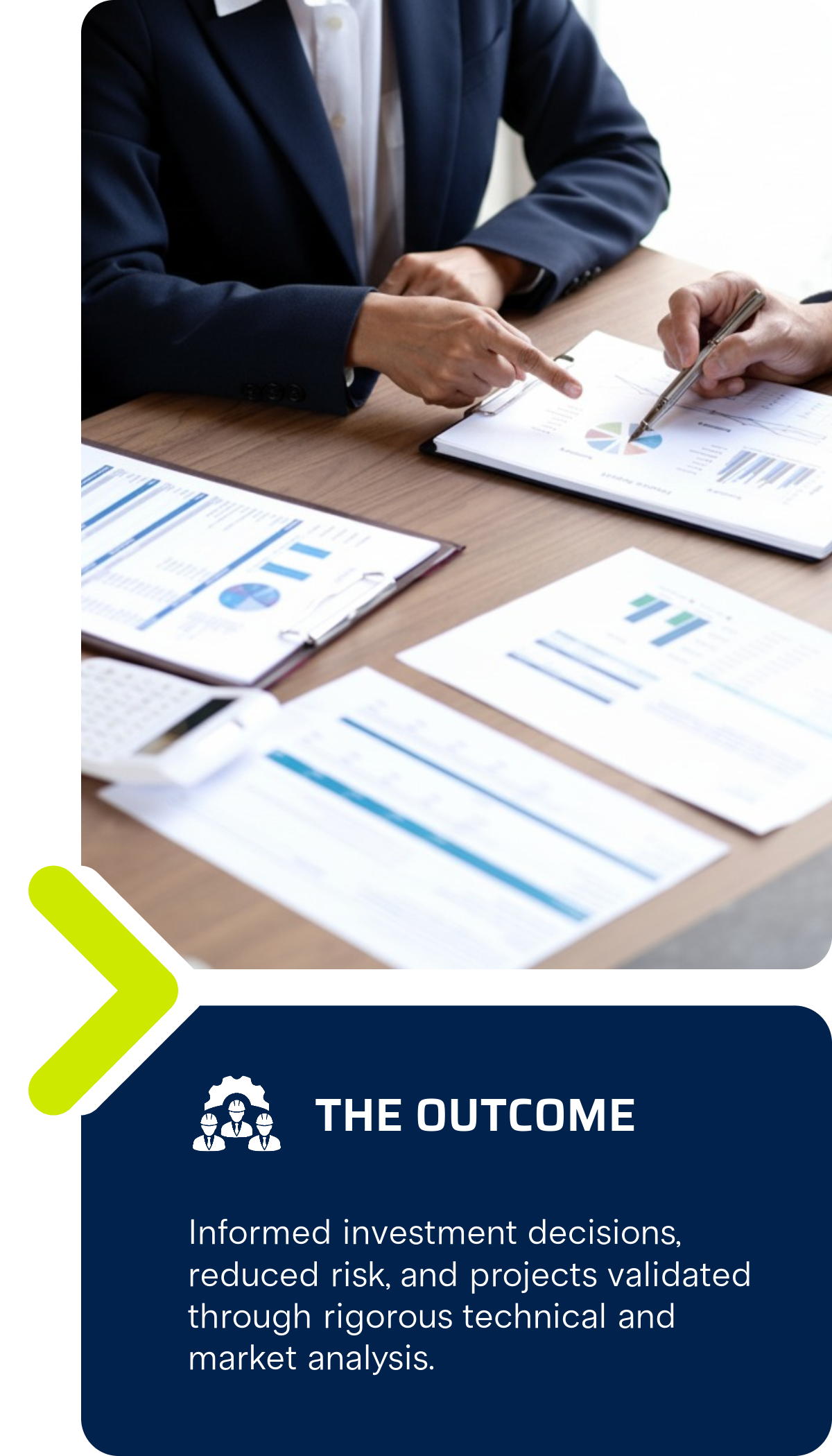 Two business professionals analyzing financial documents with charts and graphs on a wooden table, pointing at data.