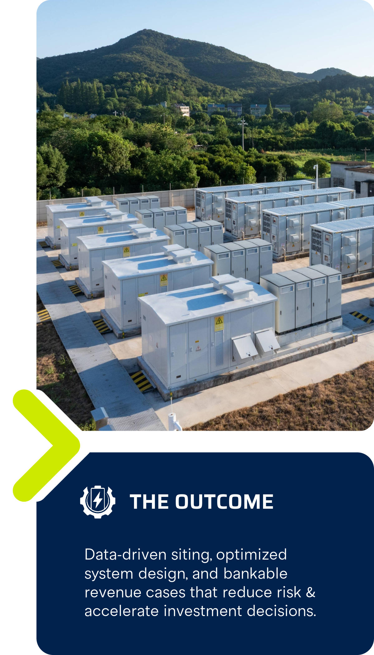 Data center rooftop with white cooling units and a lush green mountain landscape in the background.