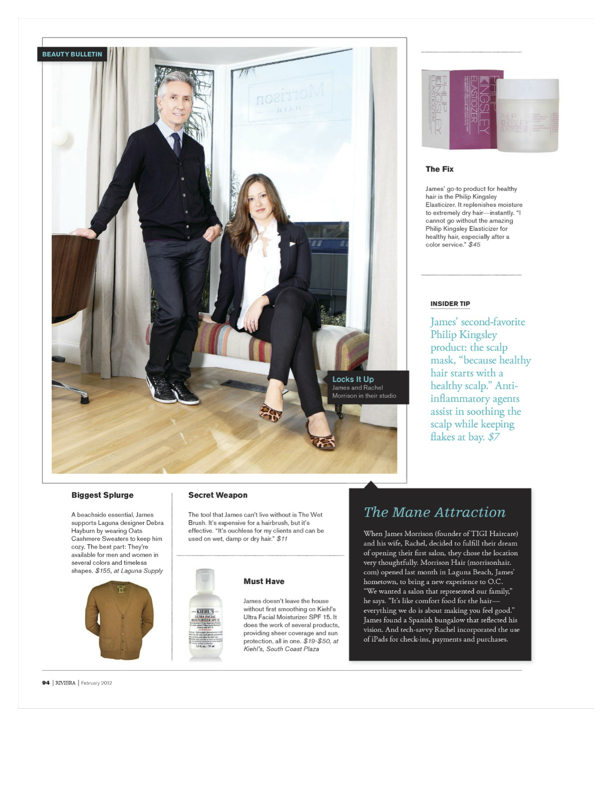 Photograph of a man in a black sweater and a girl in a black blazer sitting on a colorful bench in a room with large windows and beige curtains. The man is standing with one hand on the chair and the girl is sitting with crossed legs, wearing leopard