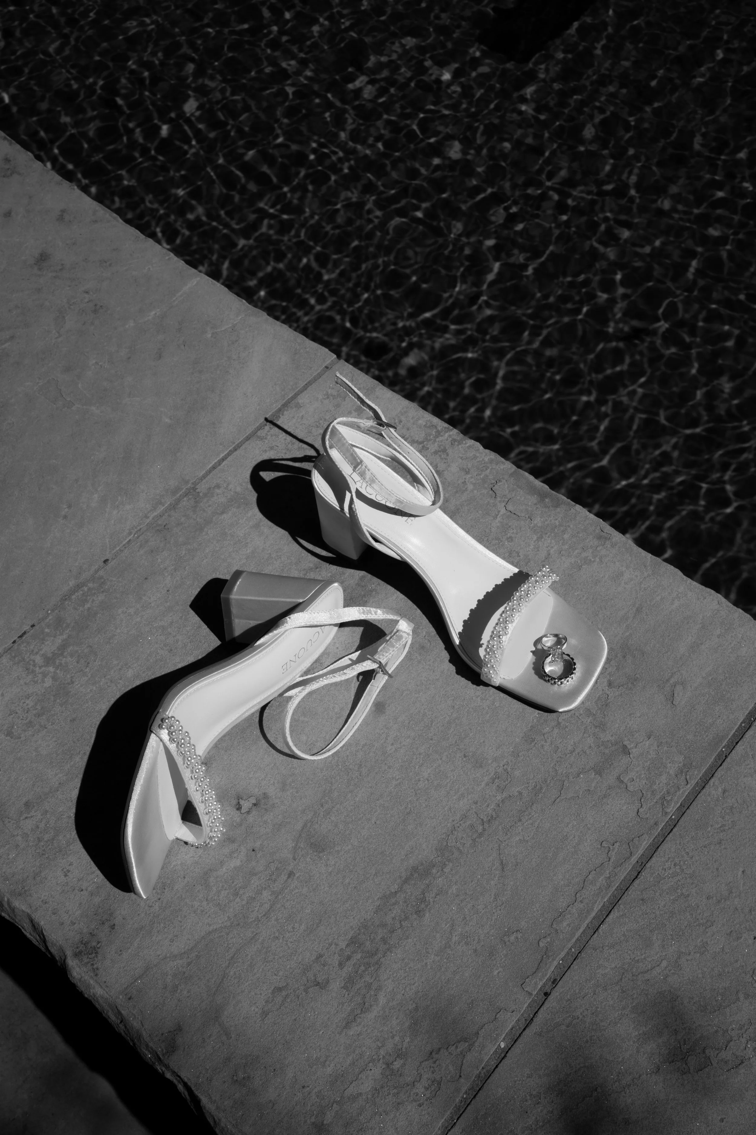 Minimal black and white wedding detail highlighting textures and movement at a Fort Worth wedding.