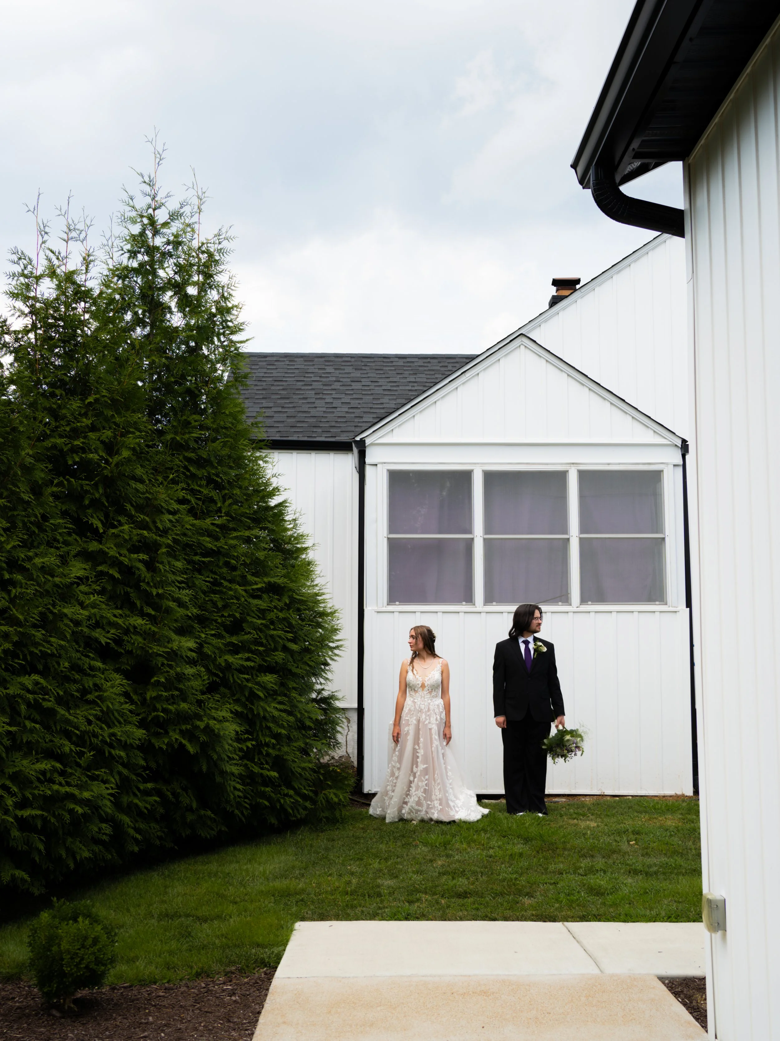A clean and minimal portrait in O’Fallon, MO, framed by simple architecture and natural light.