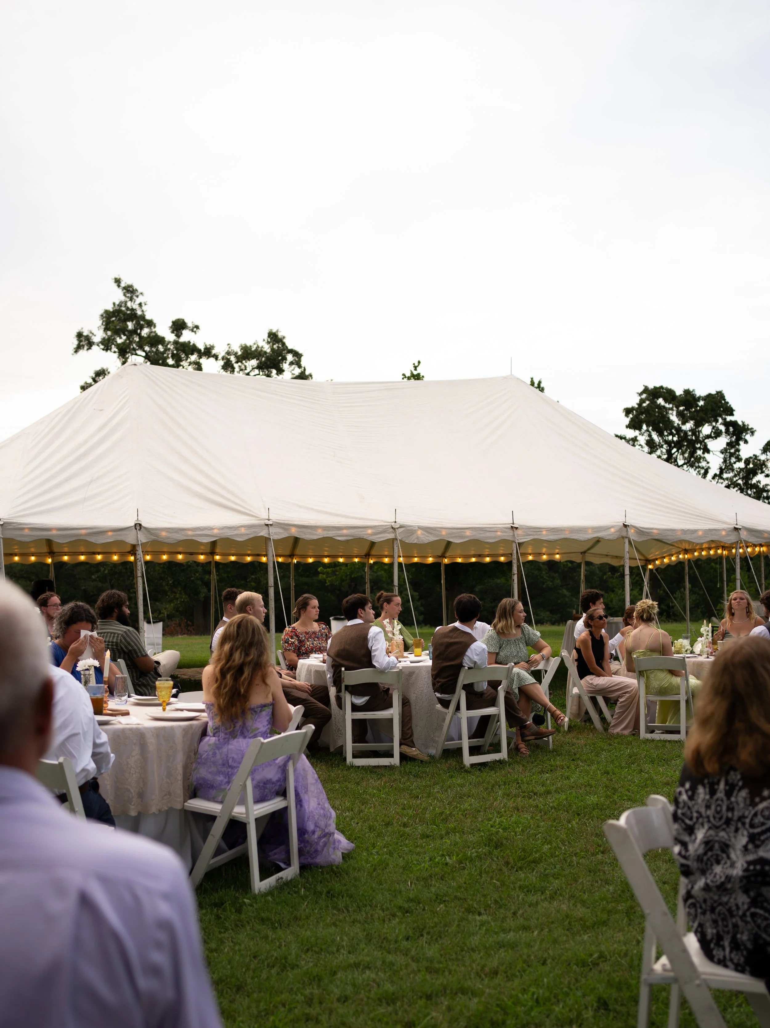 Backyard white tent wedding reception 