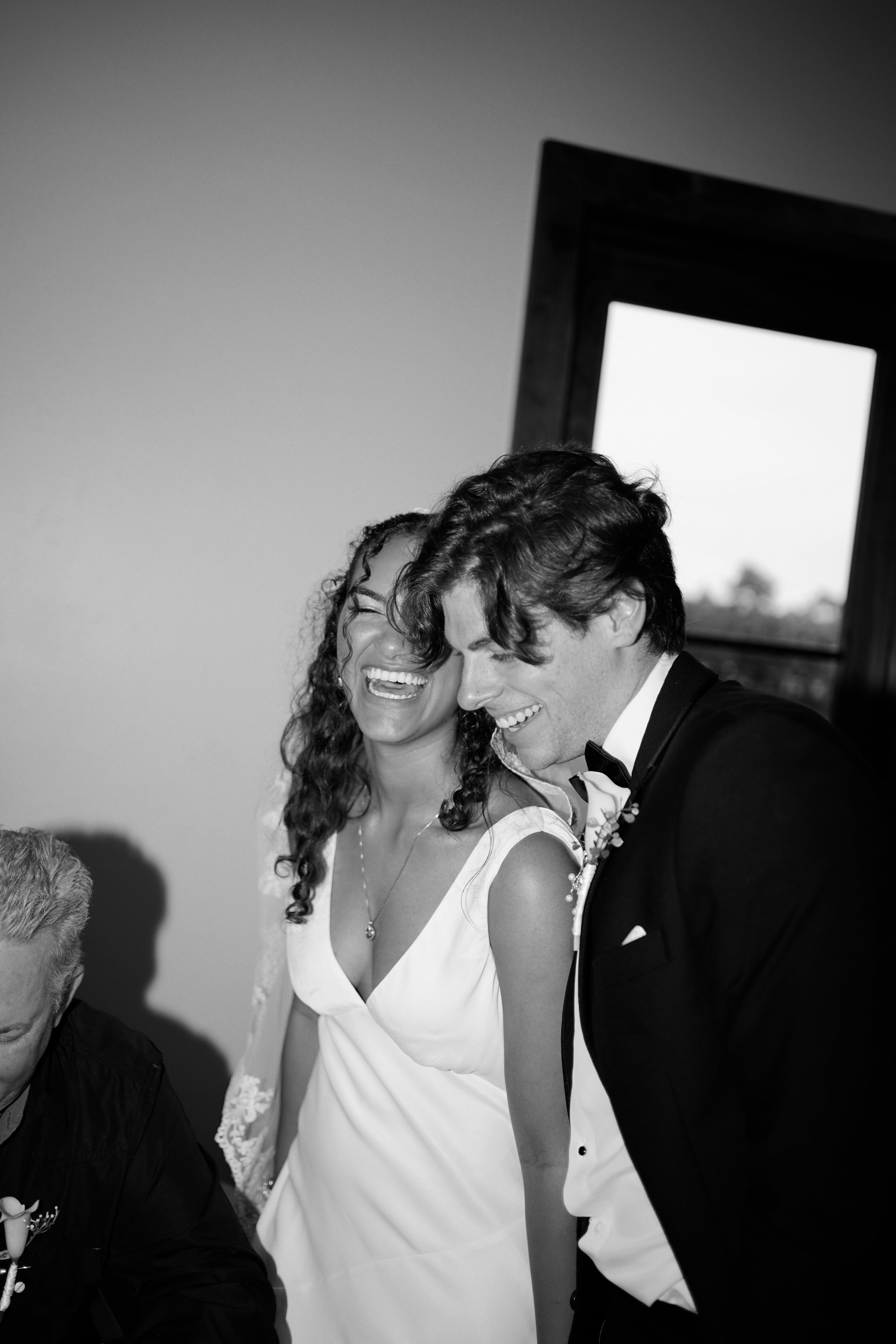 A soft black-and-white candid portrait in Richmond, Texas, capturing intimacy and quiet connection.