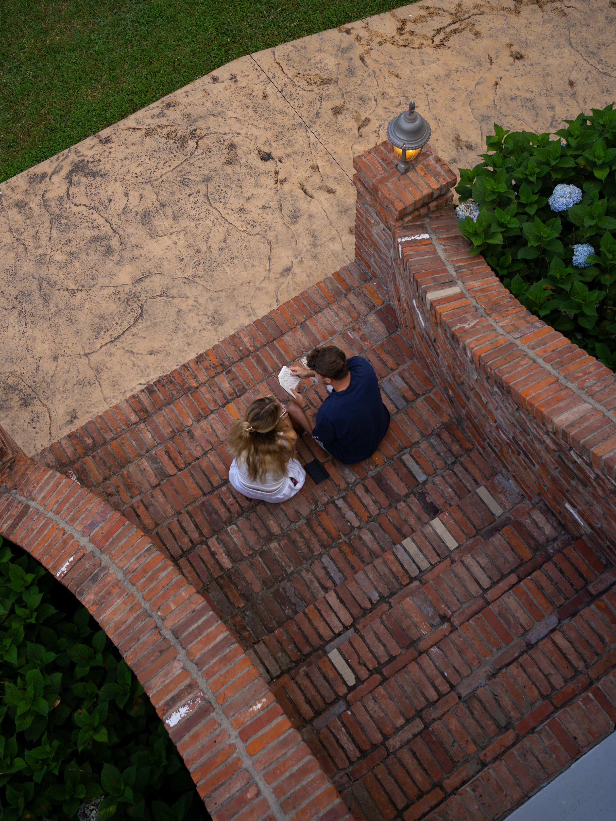 Bride and groom reading personal private vows on the morning of their wedding before getting ready
