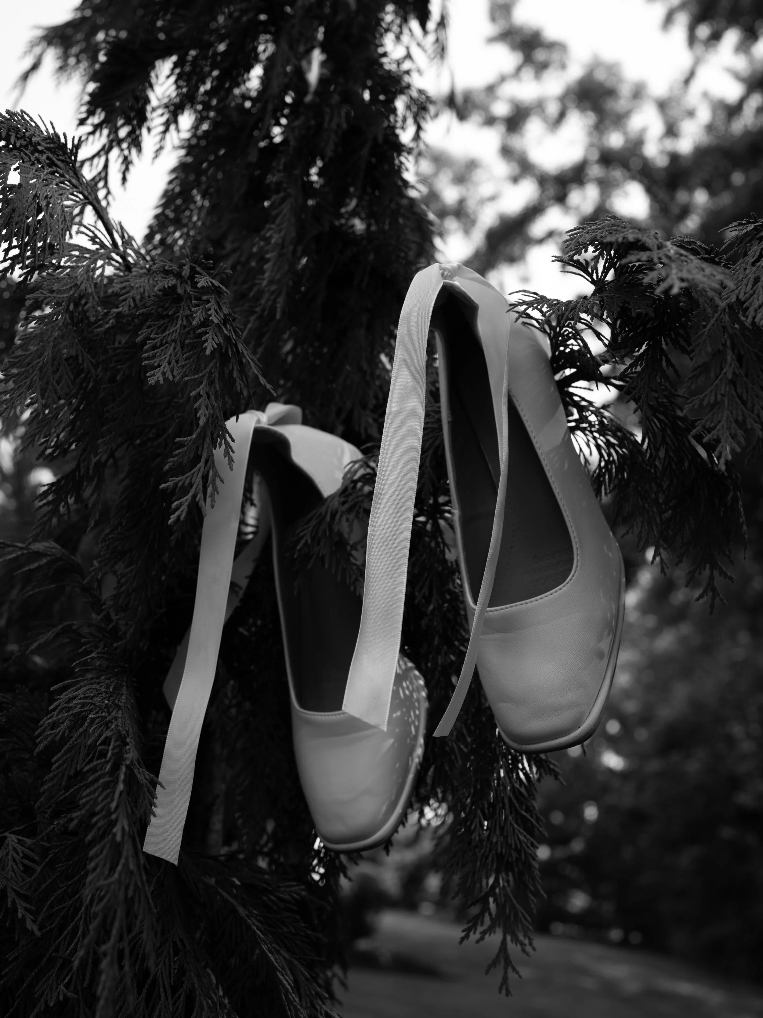 A timeless black-and-white bridal detail in O’Fallon, MO, highlighting texture and simplicity.
