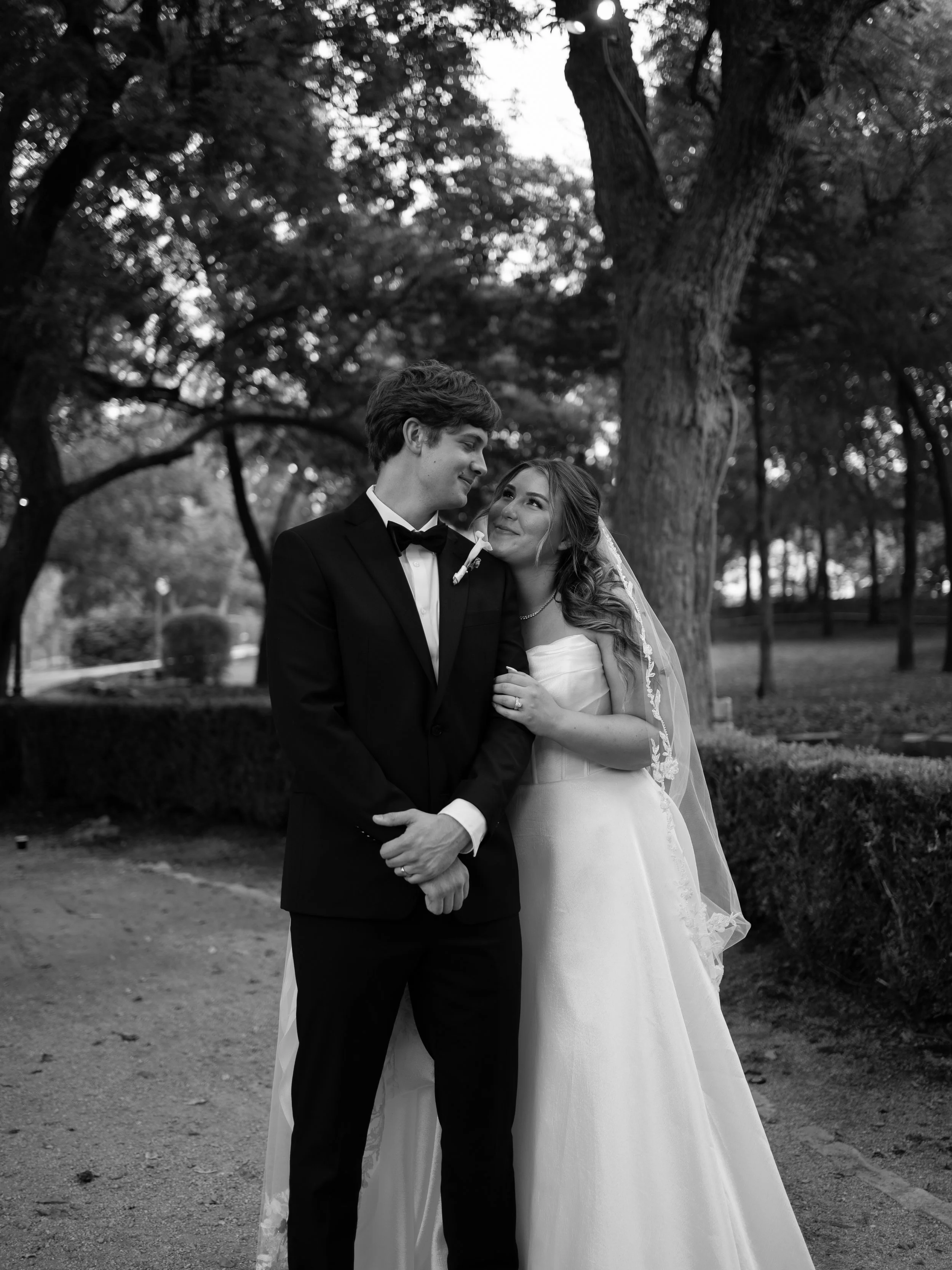 A timeless black-and-white portrait in Waxahachie, TX, capturing quiet connection and classic romance.