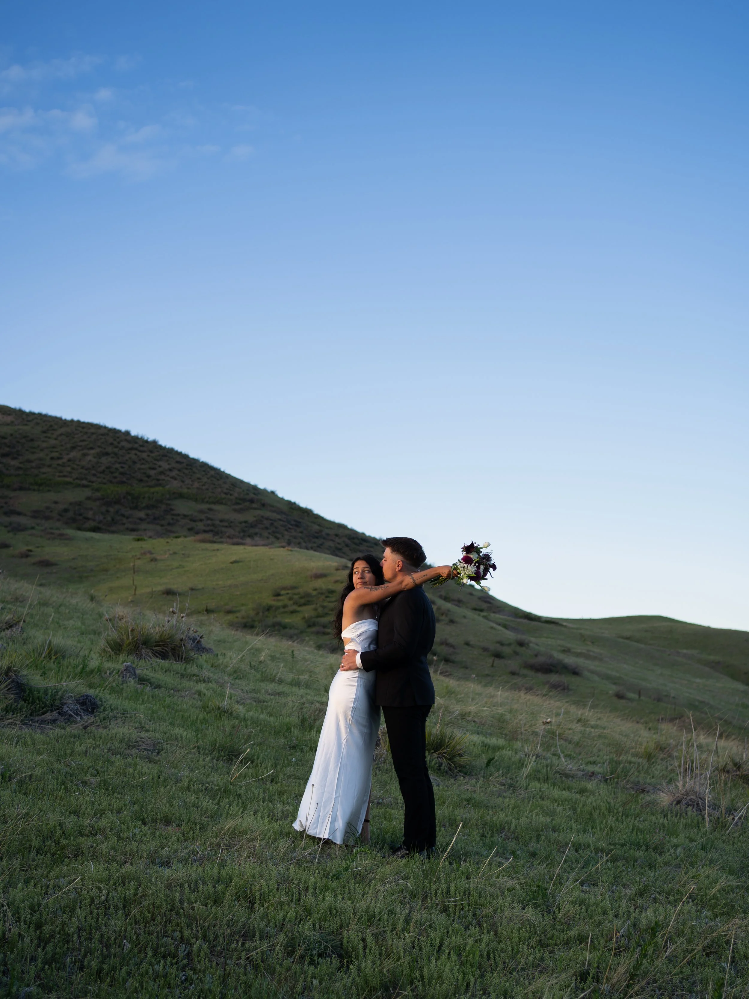 A joyful, movement-filled portrait in Boulder, Colorado, capturing energy and connection in open space.