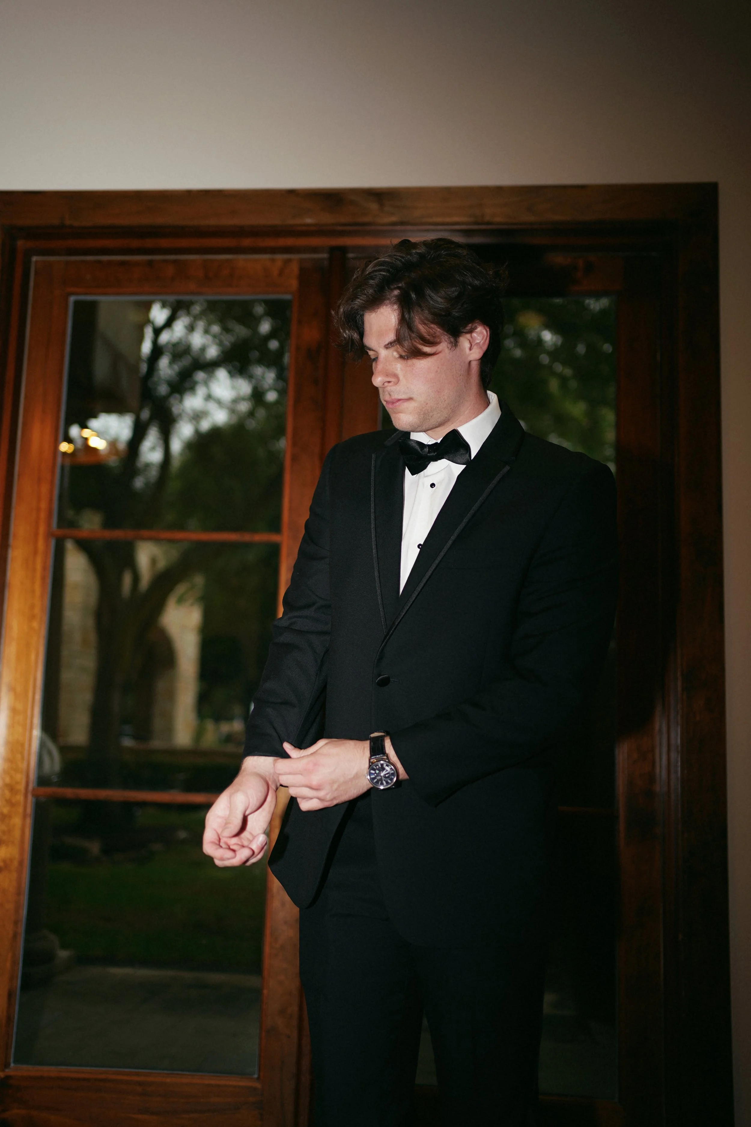 An editorial-style groom portrait in Richmond, TX, framed with clean lines and natural light.