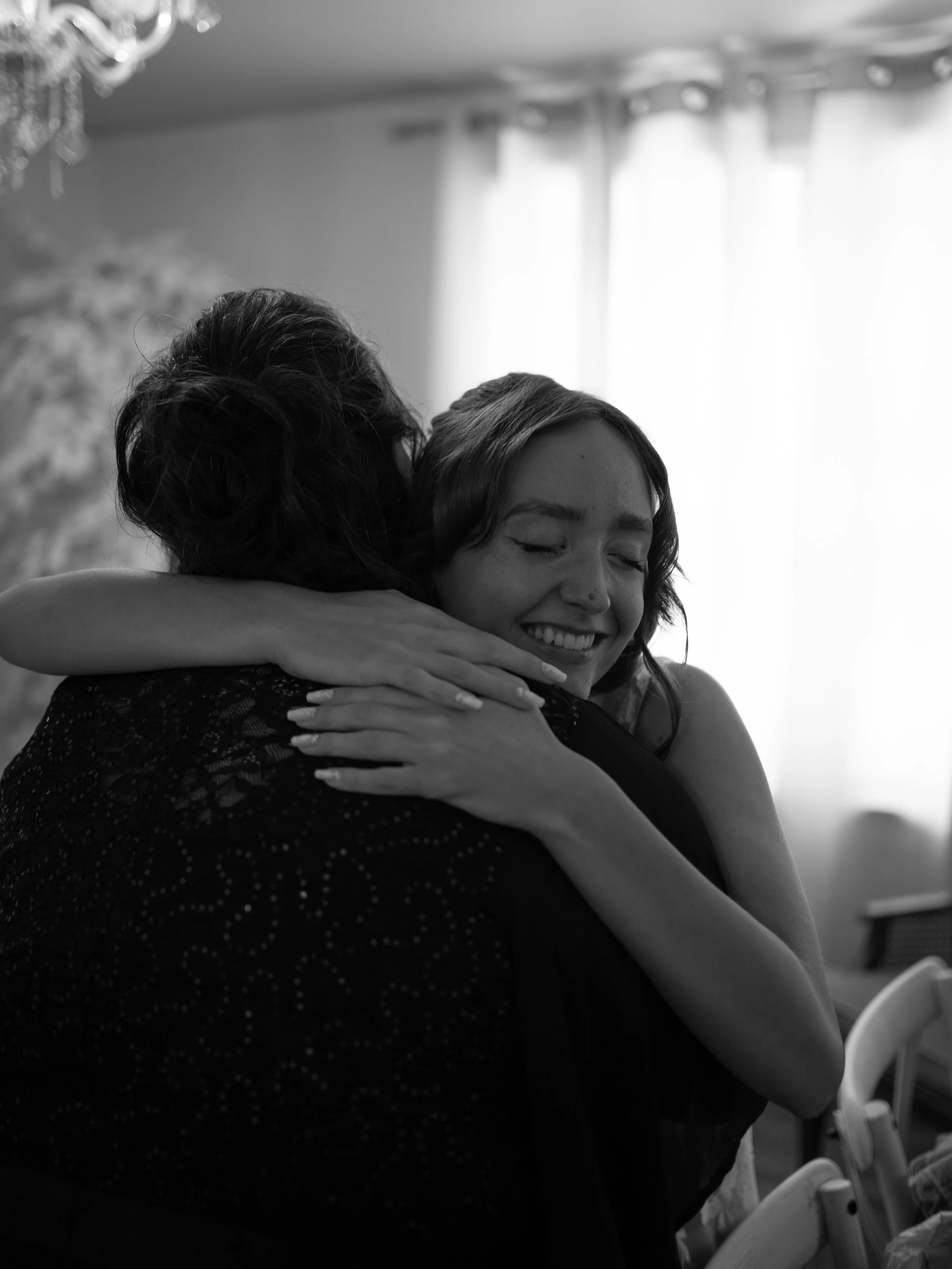 A heartfelt black-and-white moment in O’Fallon, Missouri, capturing emotion and connection between loved ones.