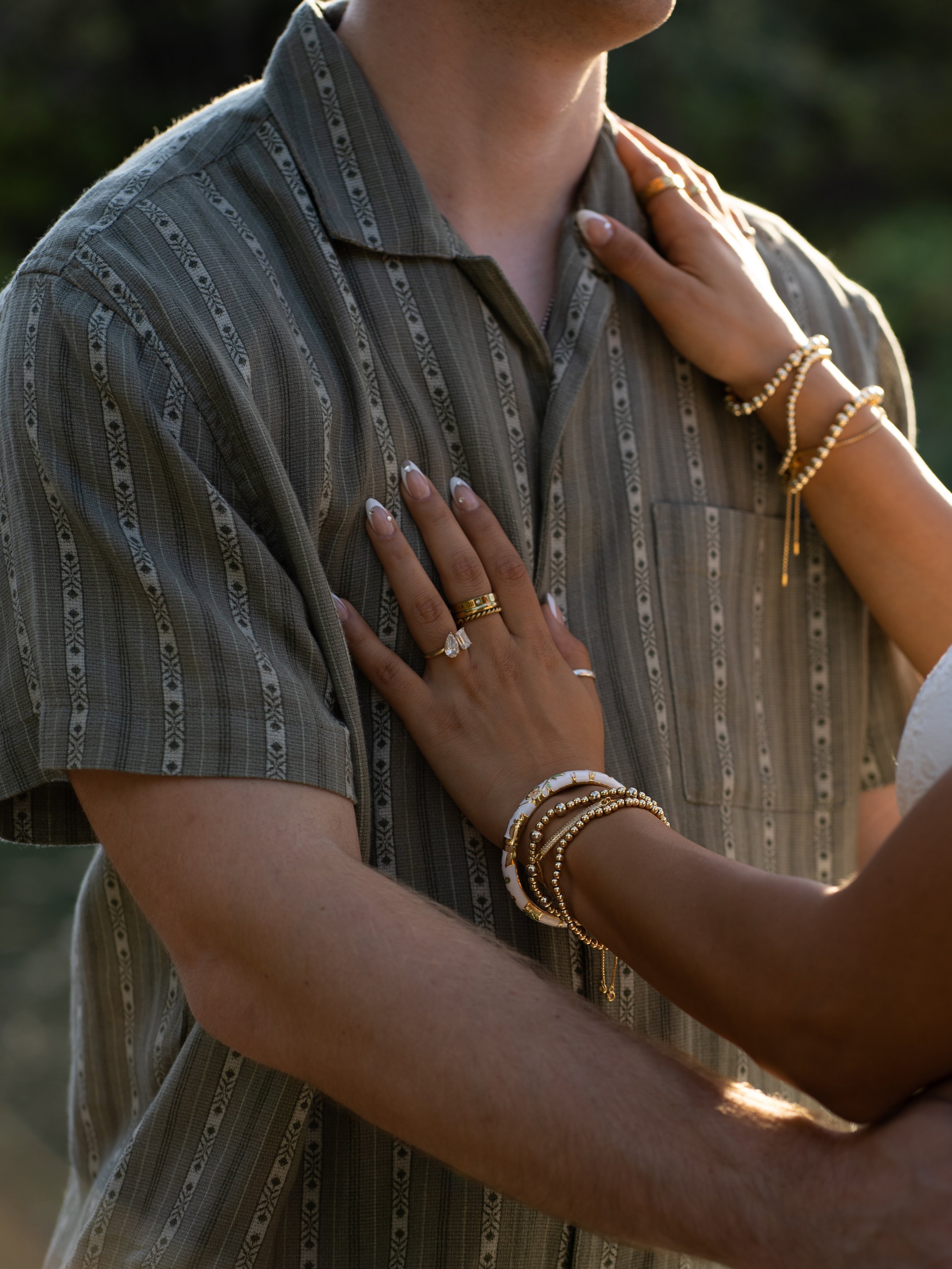 An intimate detail in Mammoth Springs, AR, highlighting hands, texture, and personal touches through an editorial lens.