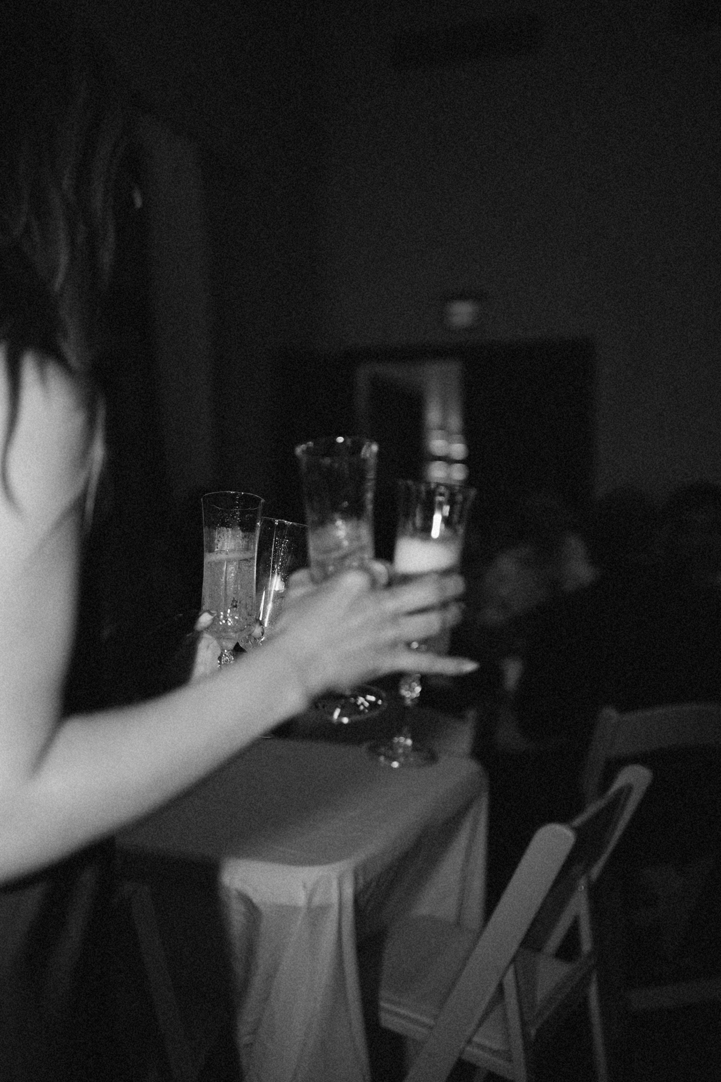 A moody black-and-white reception detail in Richmond, Texas, highlighting atmosphere and texture.