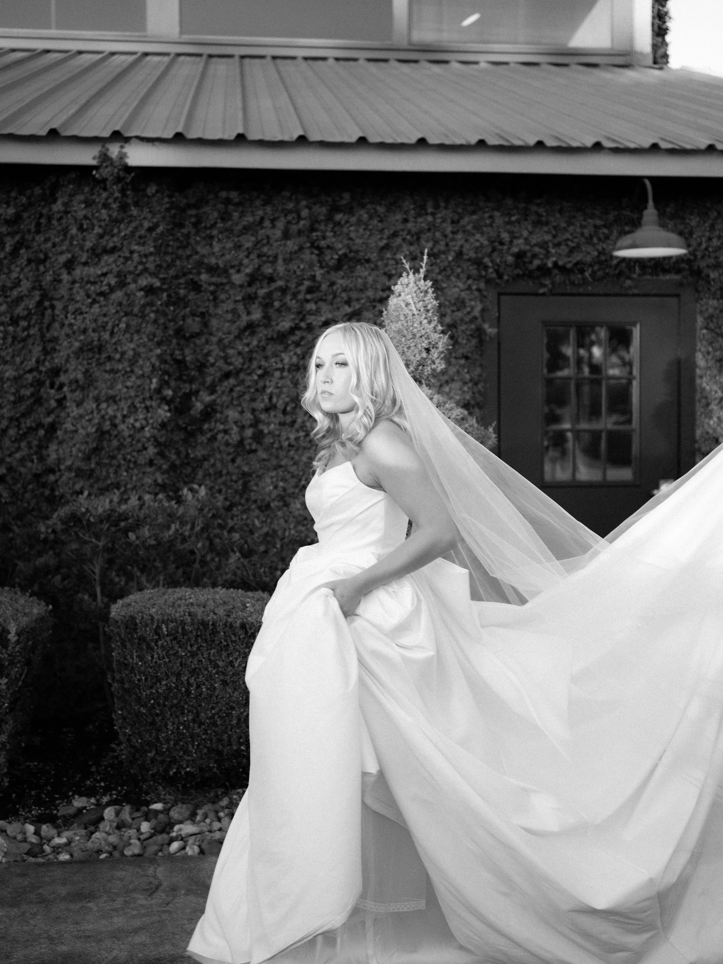 A graceful bridal movement shot in Montgomery, Texas, capturing the softness of the gown and veil as the day unfolds naturally.