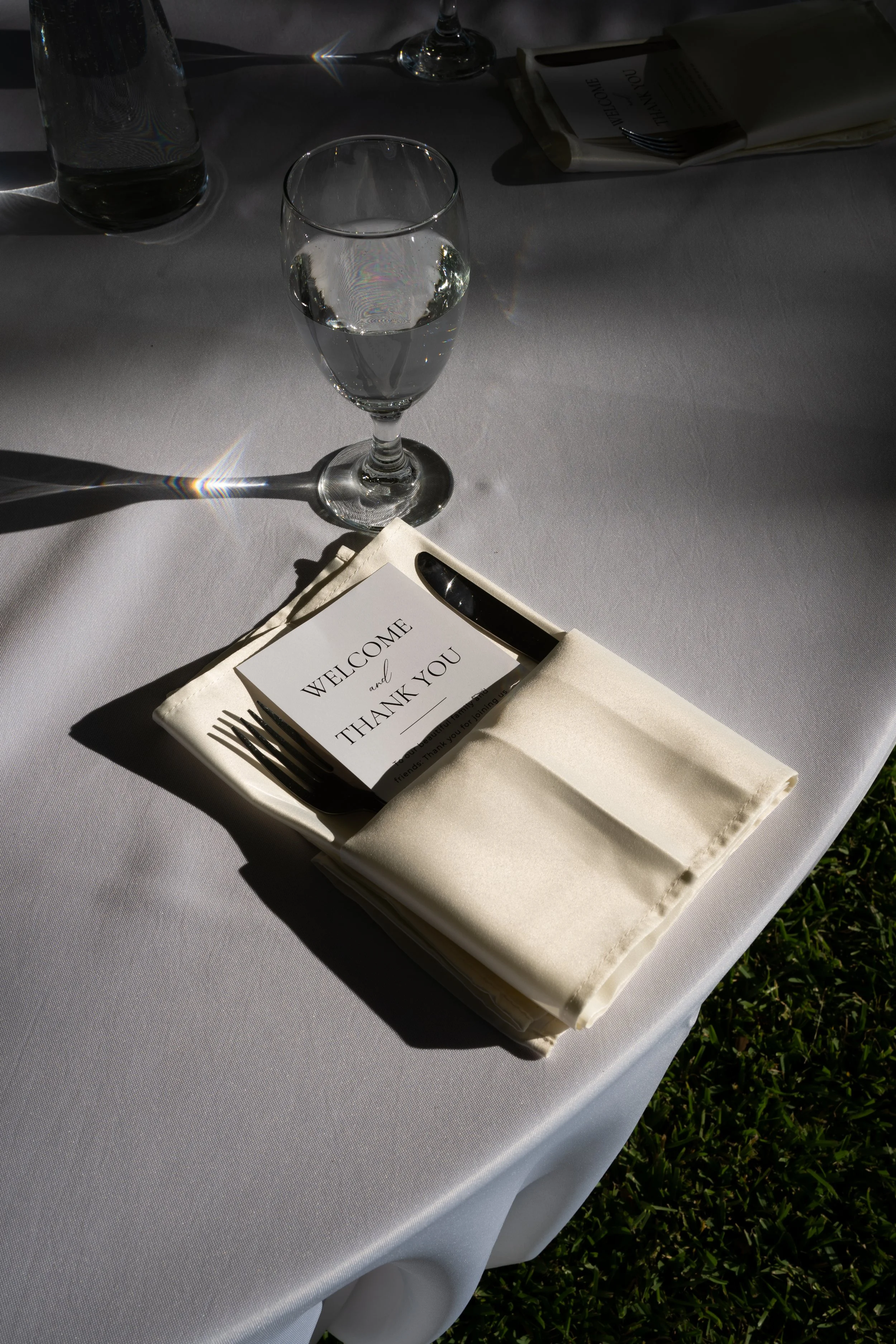 Wedding reception table details for a Fort Worth backyard tent wedding.