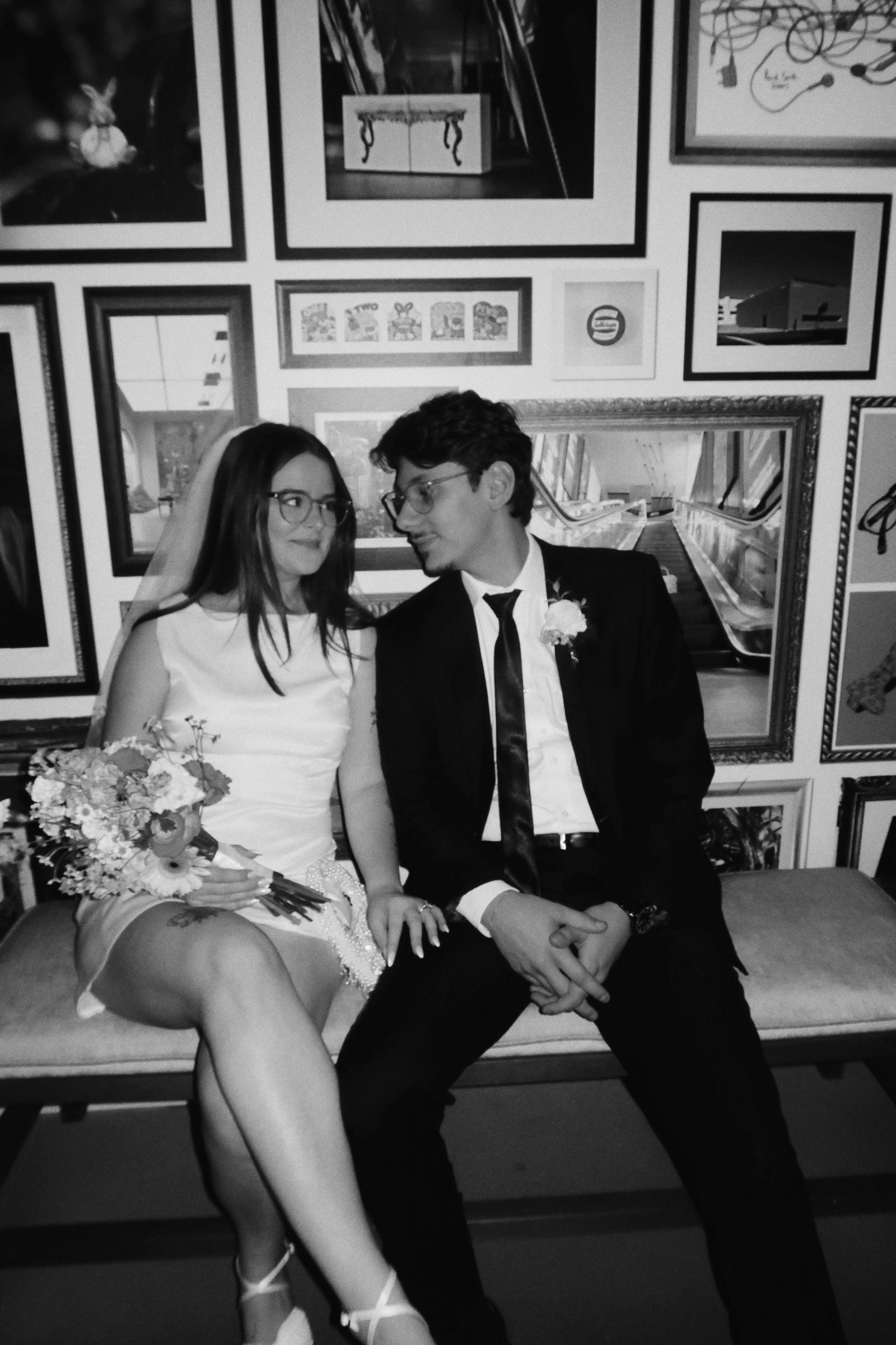 An editorial black-and-white portrait of the couple in Houston, TX, blending fashion-inspired composition with genuine connection.