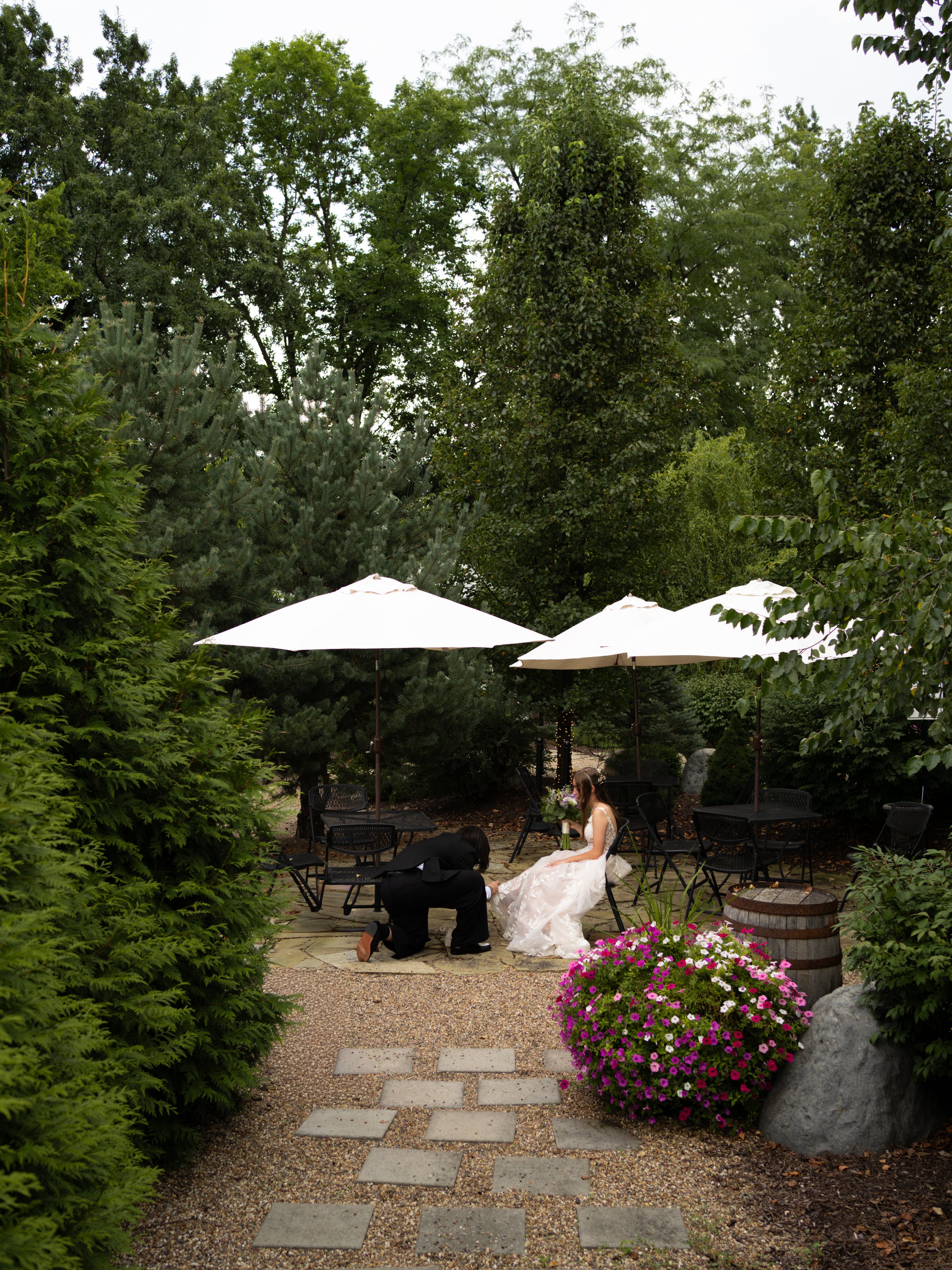 A peaceful outdoor reception setup in O’Fallon, MO, surrounded by greenery and natural textures.