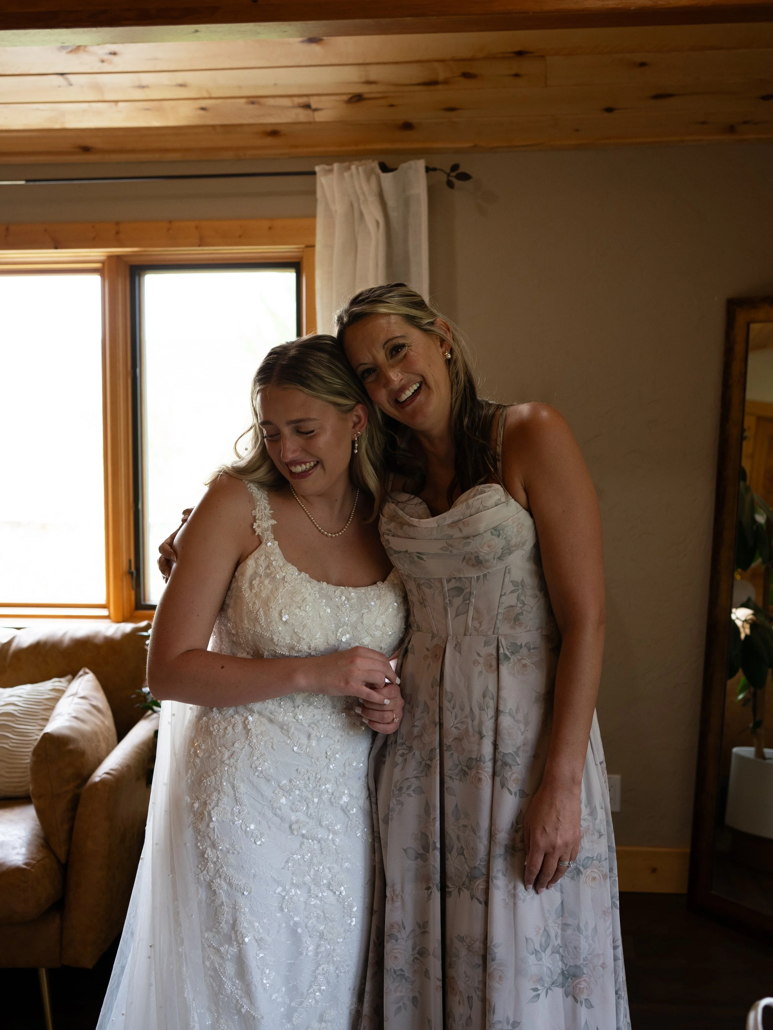 A soft and intimate getting-ready moment in Woodland Park, Colorado, capturing warmth and anticipation.