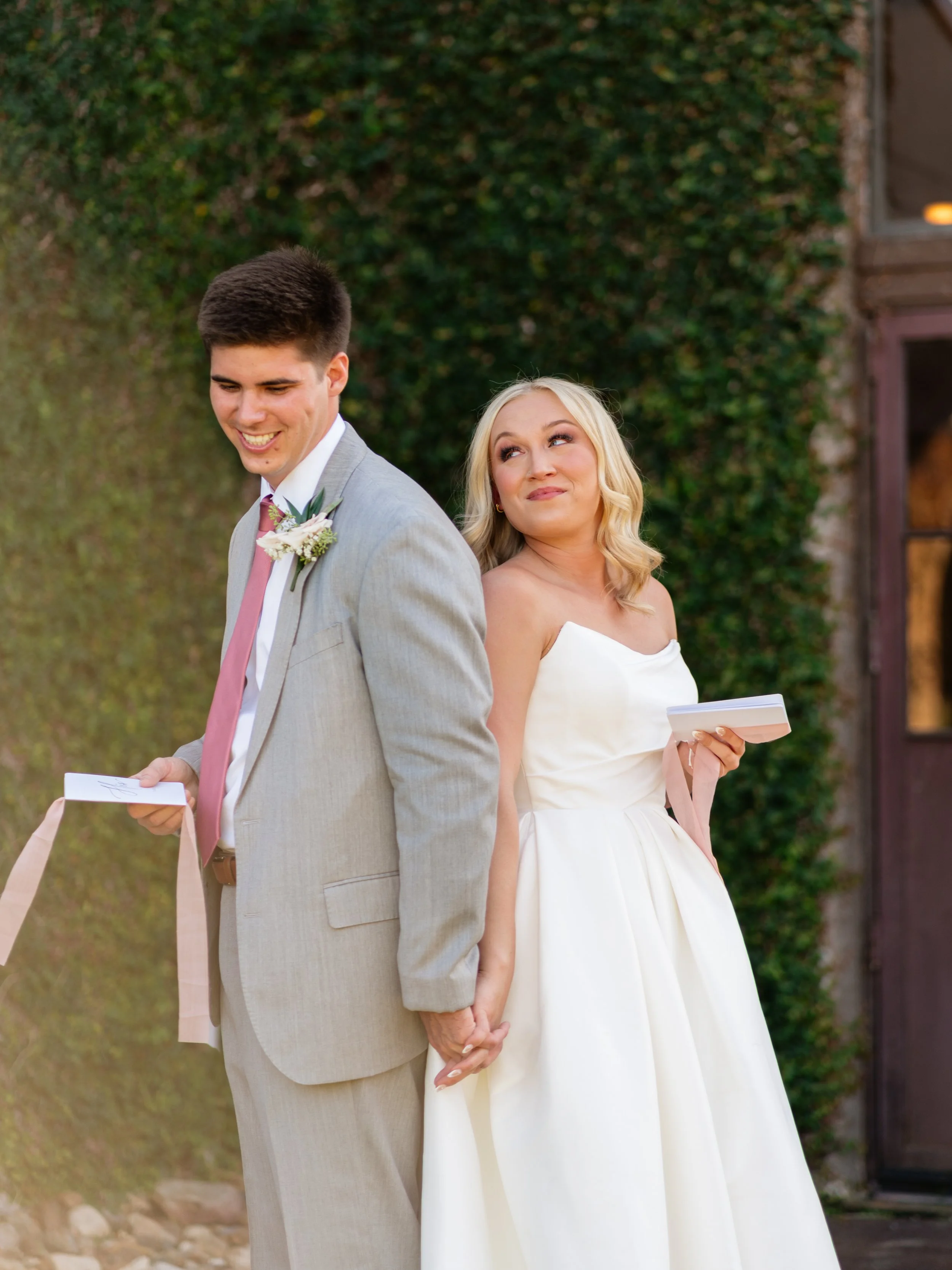 A playful and romantic couple’s portrait during their first look and private vows in Montgomery, TX, capturing personality and connection with a lighthearted, editorial feel.