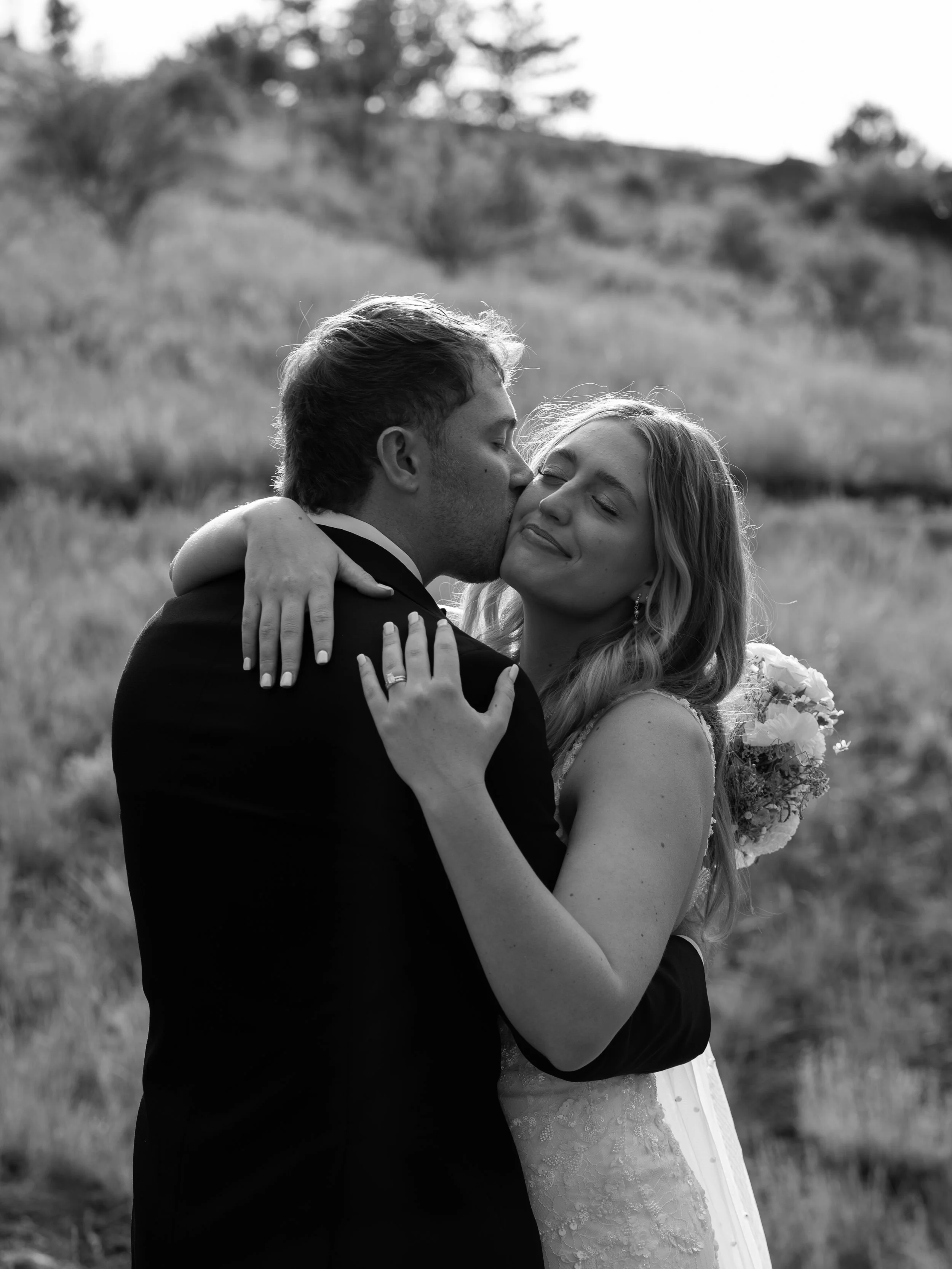 A timeless black-and-white portrait in Woodland Park, CO, capturing intimacy and quiet connection.