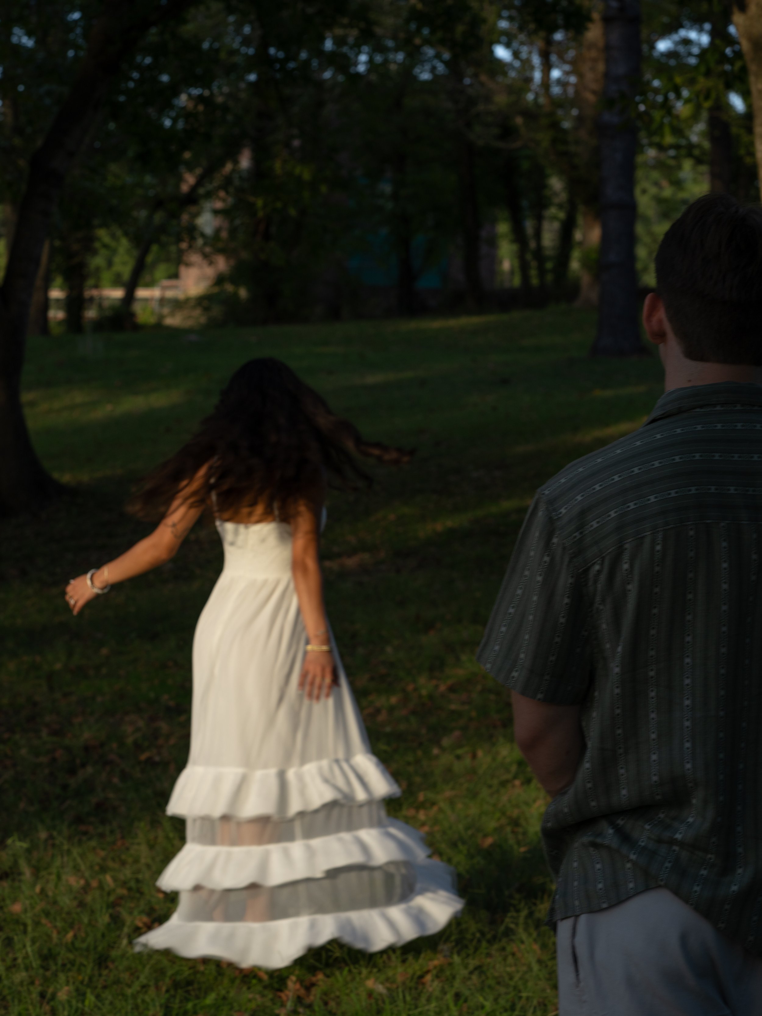 A playful and dynamic moment in Mammoth Spring, Arkansas, capturing movement and carefree energy.