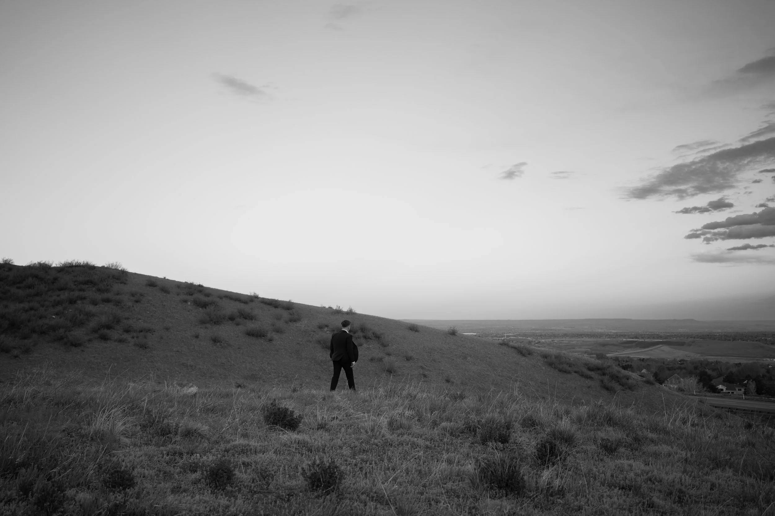 A cinematic black-and-white landscape in Boulder, CO, emphasizing scale, solitude, and natural beauty.
