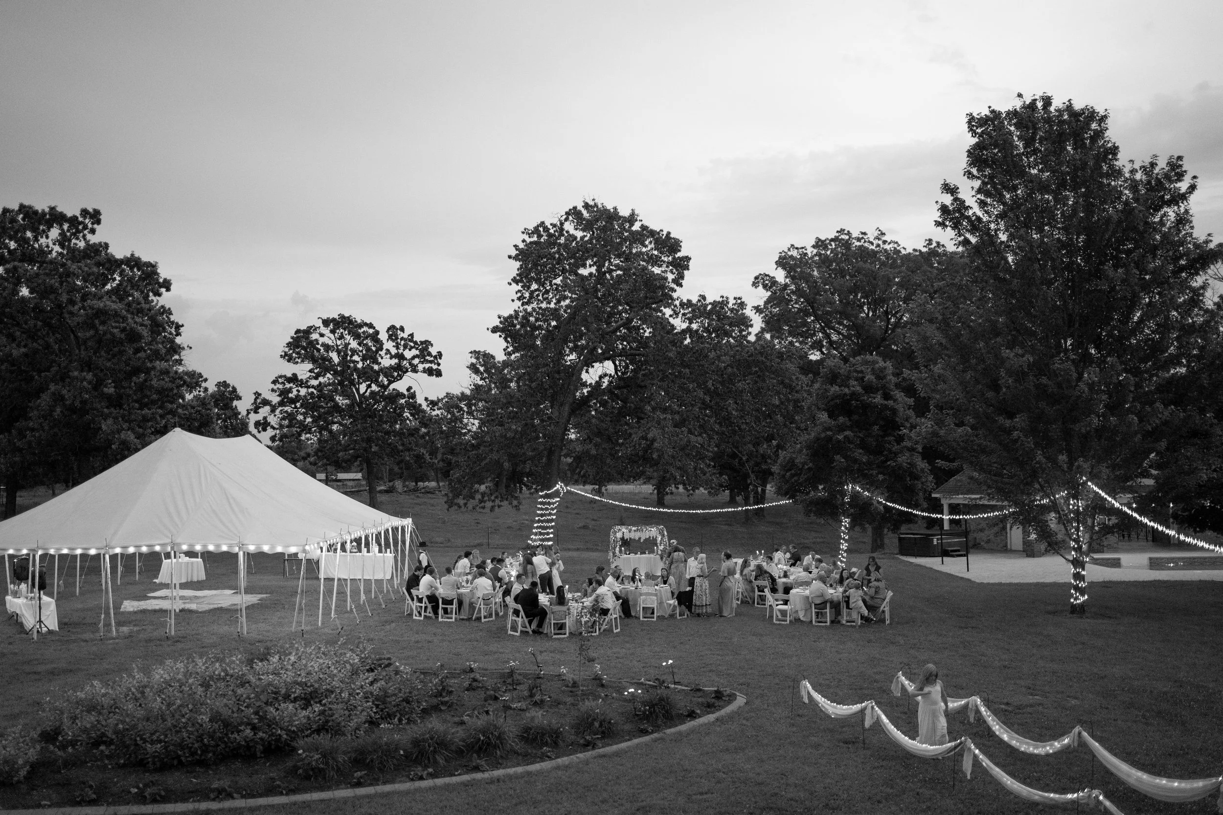 Backyard wedding white tent reception in Bella Vista, Arkansas