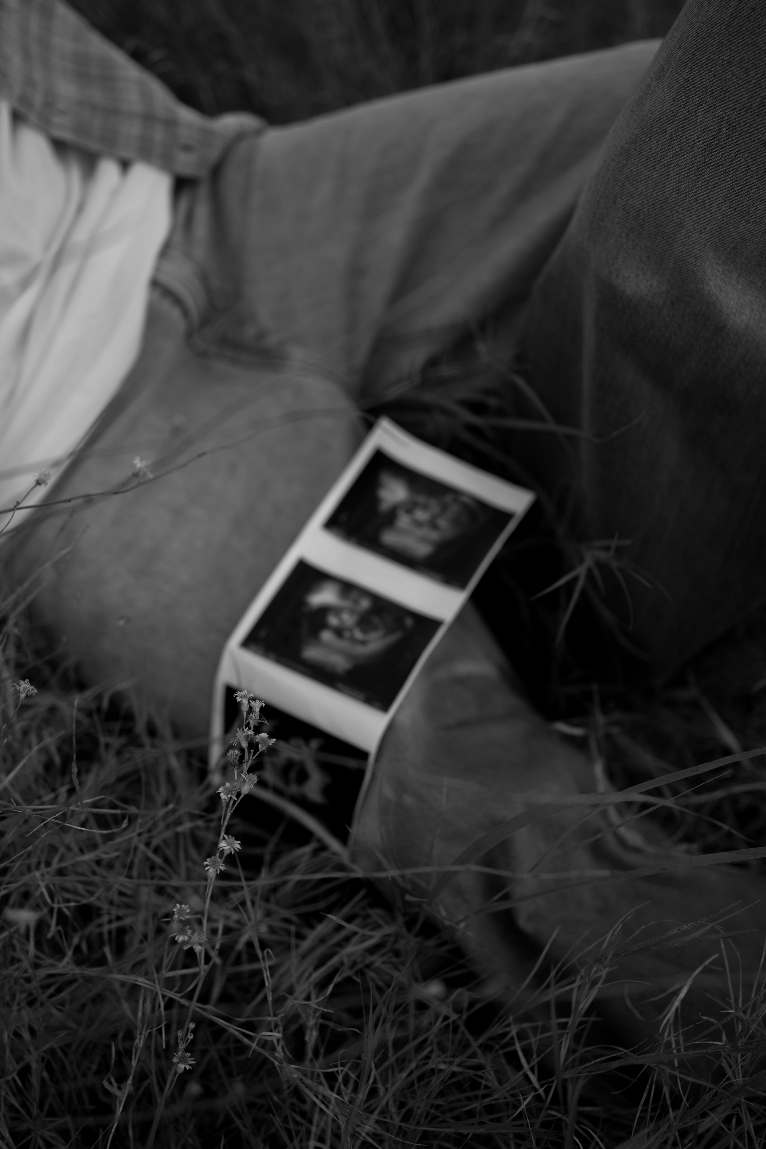 A meaningful black-and-white detail in Rainbow, TX, capturing ultrasound images and the anticipation of new life.