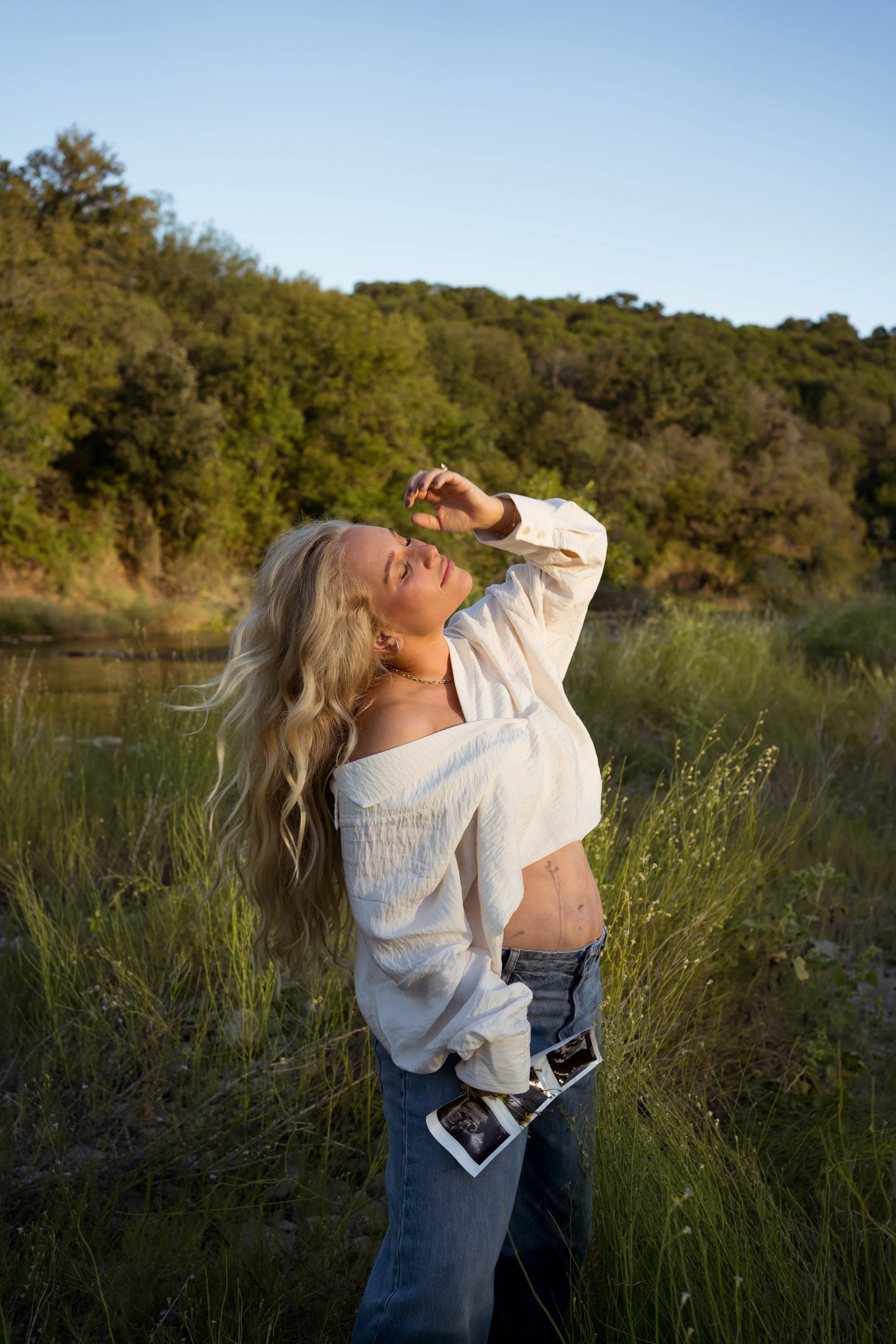 A glowing maternity portrait in Rainbow, Texas, highlighting warmth, light, and the beauty of this season.