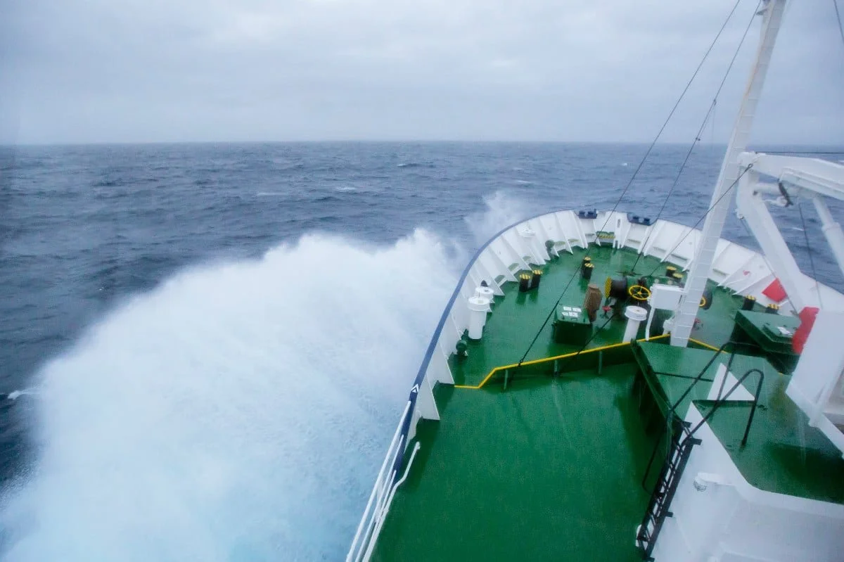 Fly or Sail the Drake Passage?