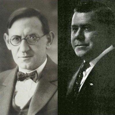 Black and white photograph of two men side by side, one wearing glasses and a bow tie, the other in a suit, both looking at the camera.