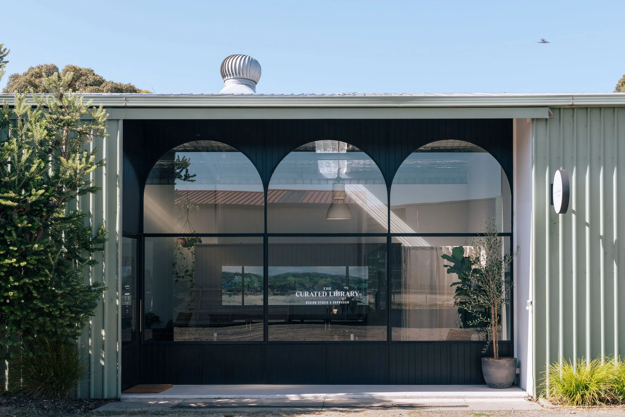 This shows The Curated Library Front Facade of Showroom