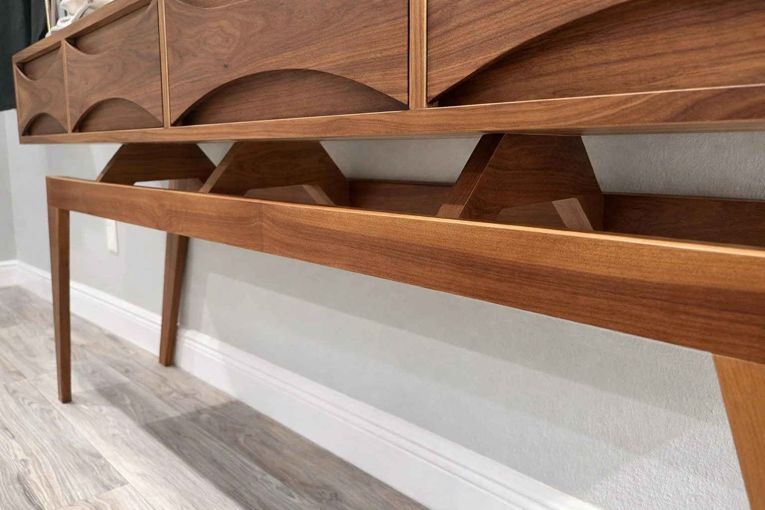 Architectural base designed to complement the casework of mcm entryway table