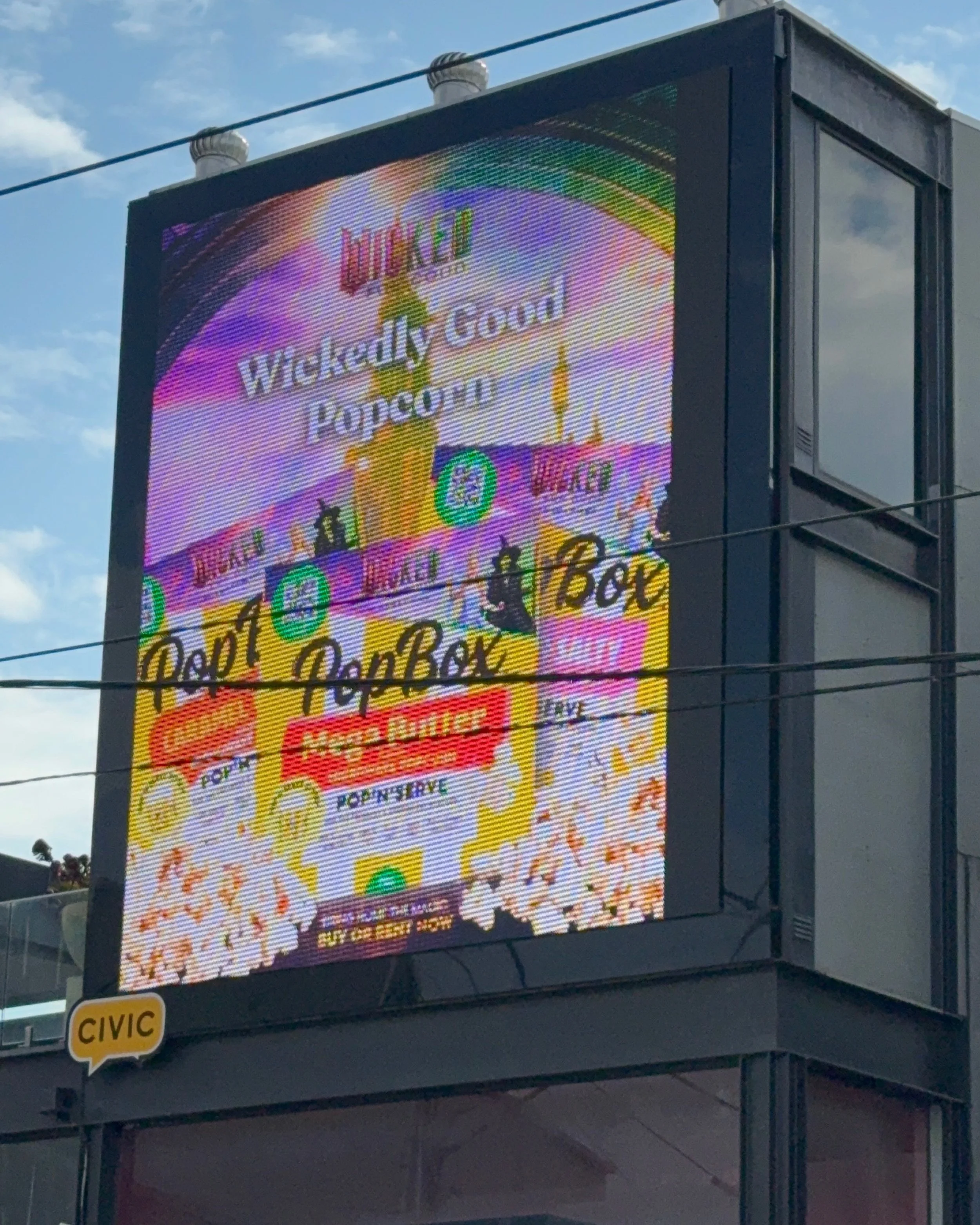 High impact billboard design for PopBox: Wicked For Good, out in the big wide world!