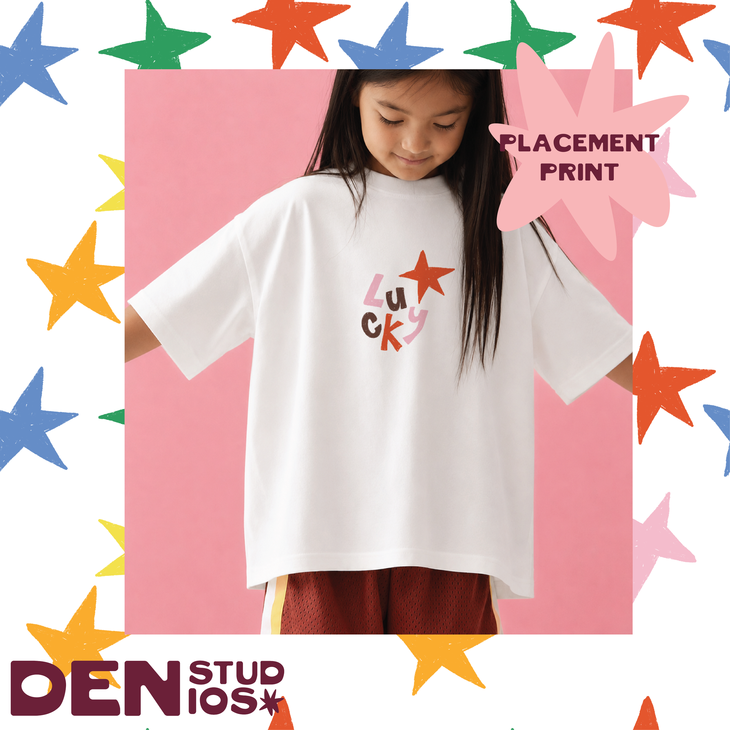 Lucky Star Ready Edit placement on kids oversized tee in strawberry patch — Den Studios surface pattern design