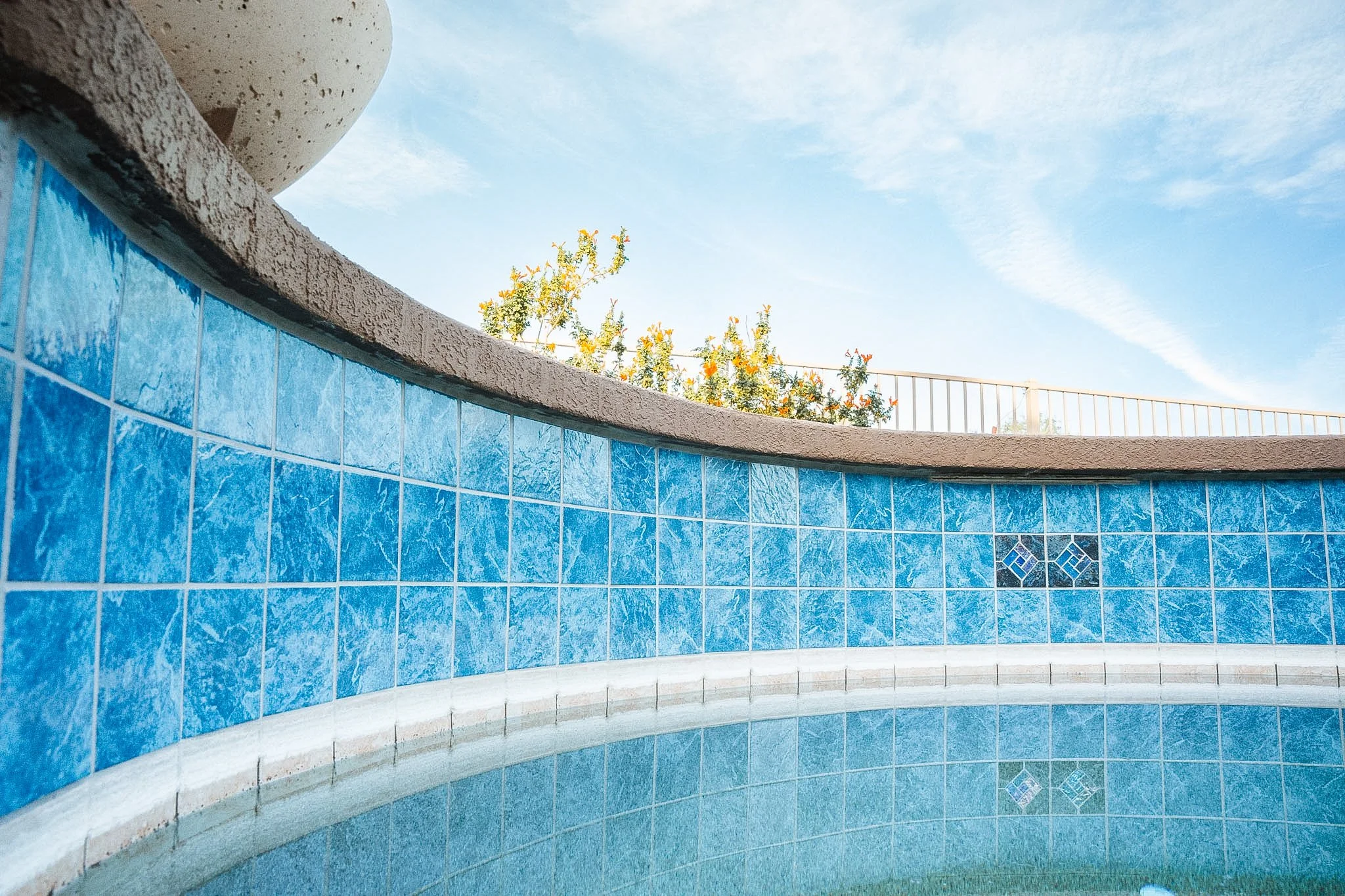 6" x 6" Blue Seas Light Blue porcelain tile paired up with Aztec Cobalt Blue Deco tile to complete a waterfall wall makeover.