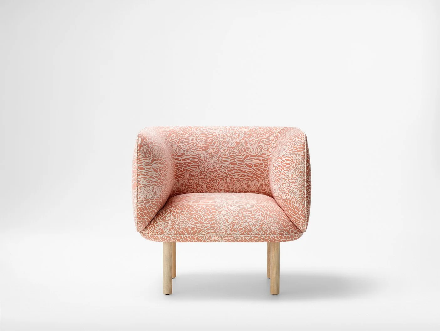 Armchair upholstered in Willie Weston Mud Ripples 'Wild Red Apple' design, adelicately patterned contemporary Aboriginal artwork by First Nations artist Elizabeth Kandabuma.