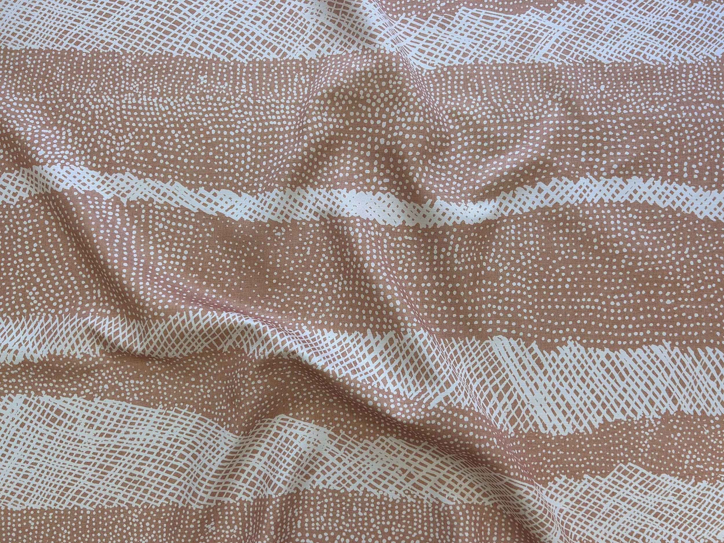 Willie Weston Jilamara 'Pink Ochre' design for upholstery, featuring dotted and cross-hatched contemporary Aboriginal artwork by Tiwi First Nations artist Jean Baptiste Apuatimi.