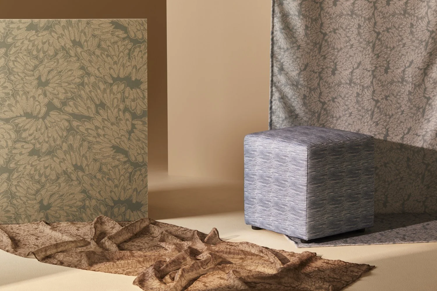 Ottoman upholstered in Willie Weston Garrigarrang Narang (Tidelines) 'Badu (water)' design featuring contemporary Aboriginal artwork by Gadigal First Nations artist Kate Constantine.