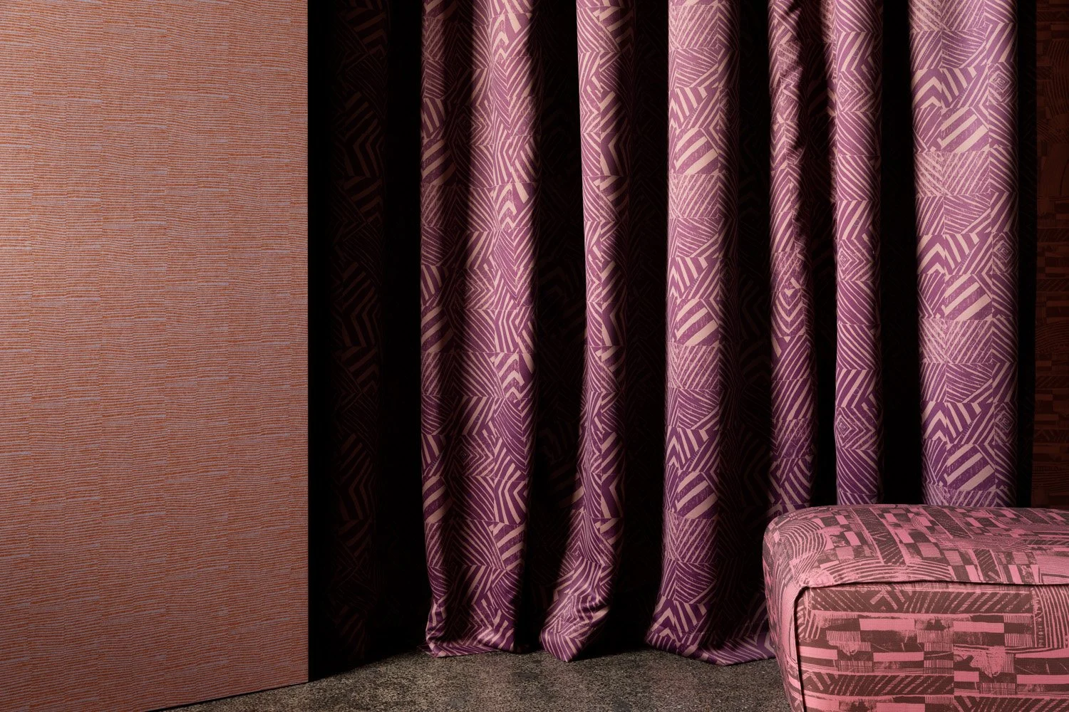 Curtain featuring Willie Weston Defragmentation ‘Mountain Berry' Blockout fabric, a bold geometric artwork by First Nations artist Lisa Waup from Naarm (Melbourne).