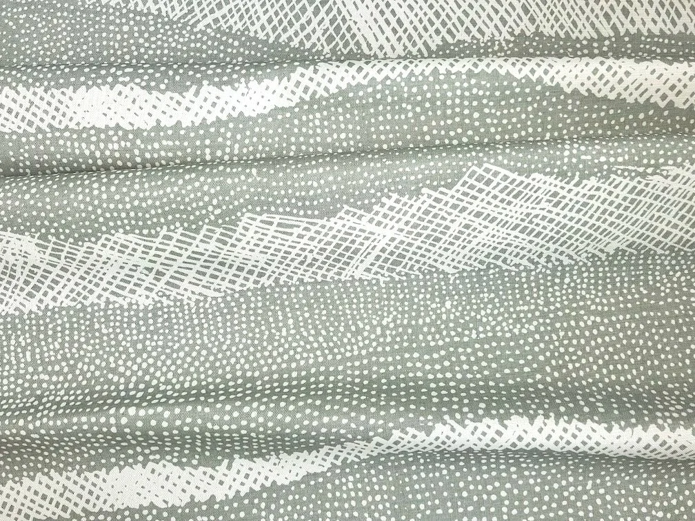 Willie Weston Jilamara 'Sea Green' design for upholstery, featuring dotted and cross-hatched contemporary Aboriginal artwork by Tiwi First Nations artist Jean Baptiste Apuatimi.