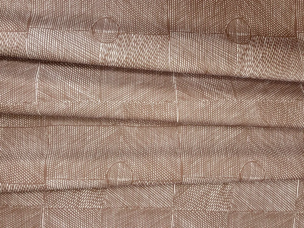Willie Weston Wak Wak ‘Bush Nut' design for upholstery, featuring a contemporary Aboriginal artwork by First Nations artist Susan Marawarr from Maningrida, NT.