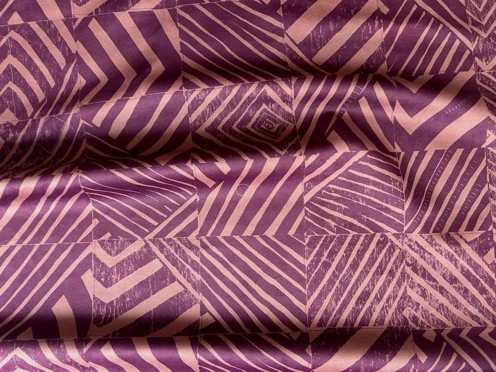 Willie Weston Defragmentation ‘Mountain Berry' design for upholstery, featuring bold geometric artwork by First Nations artist Lisa Waup from Naarm (Melbourne).