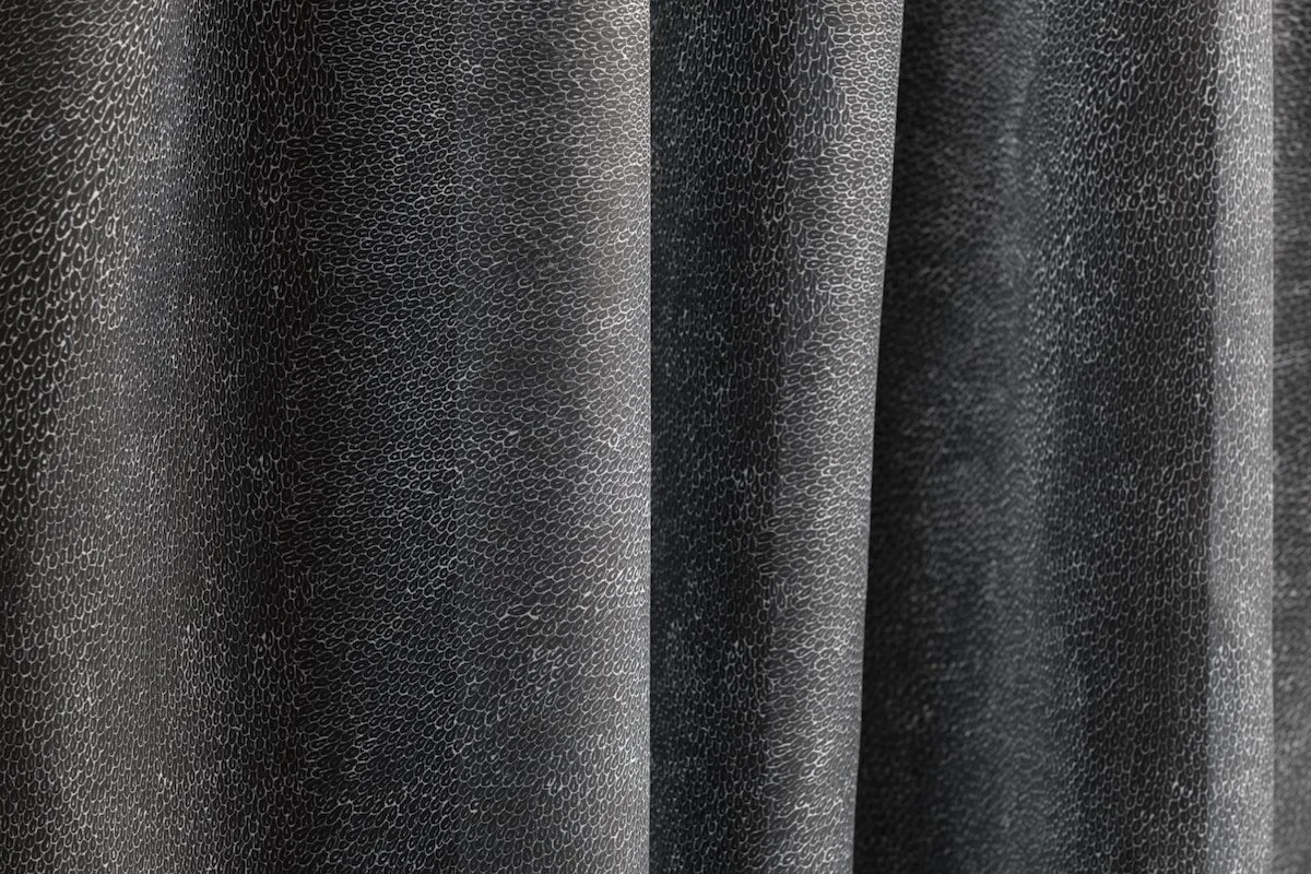 Willie Weston Native Seeds 'Midnight' design for upholstery and drapery, featuring delicately patterned contemporary Aboriginal artwork by Central Australian First Nations artist Jean Ngwarraye Long.
