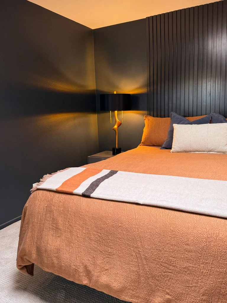 The Reed wall was crafted by a skilled finish carpenter and painted with a glossy version of the wall paint color to accentuate its texture and to give the room a modern contemporary feel.