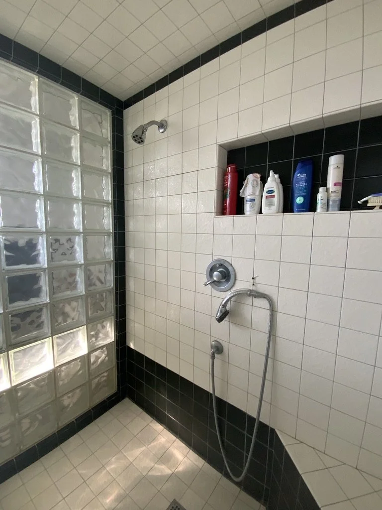 The previous version of the shower created a "boxed in" feeling that created a smaller space than it actually was.